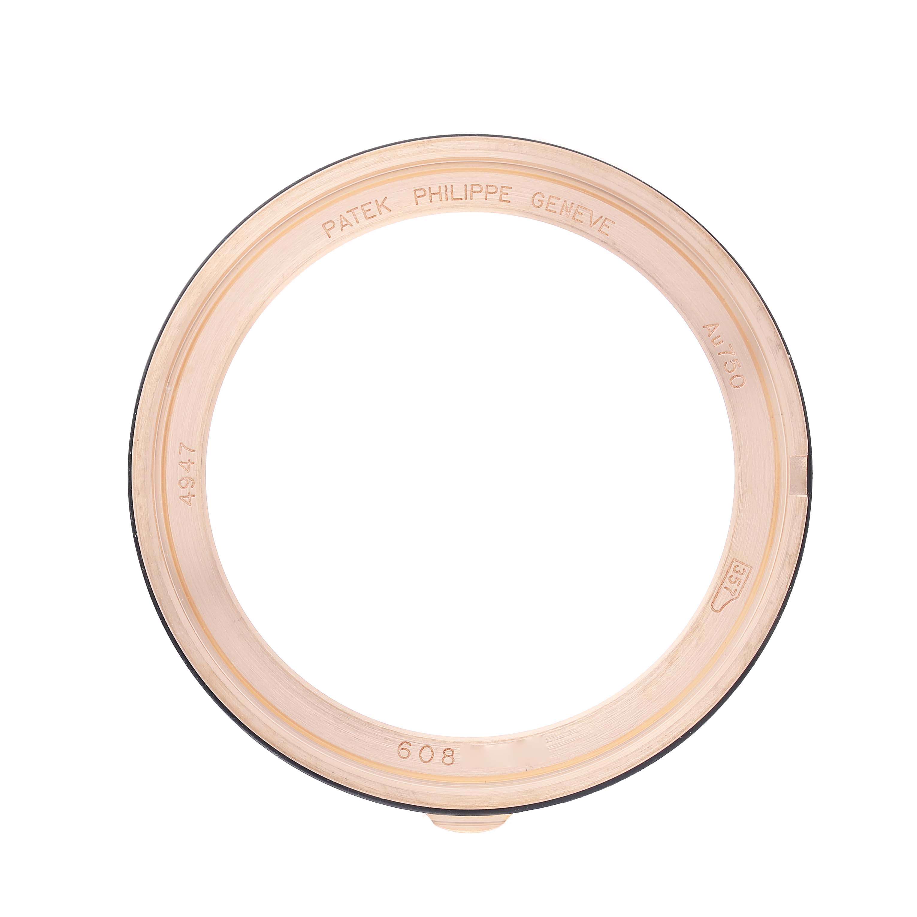 The image shows the bezel of a Patek Philippe Complications 4947R-001 Men's Rose Gold Silver Dial model, viewed from a top angle.