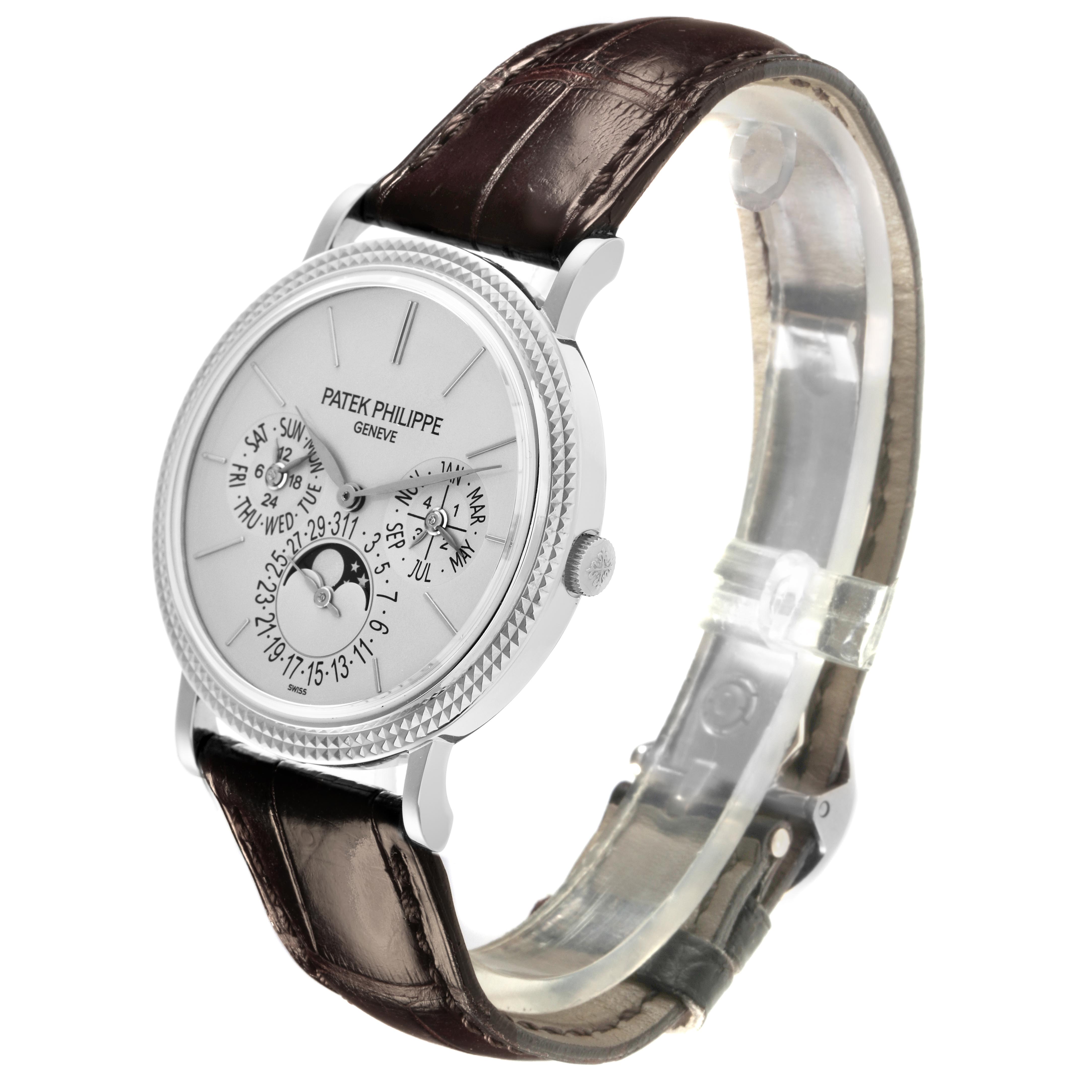 The Patek Philippe Complications 5139G-001 Men's White Gold Silver Dial 5139G-001 Men's White Gold Silver Dial watch is shown at a three-quarter angle, highlighting its dial, case, and leather strap.