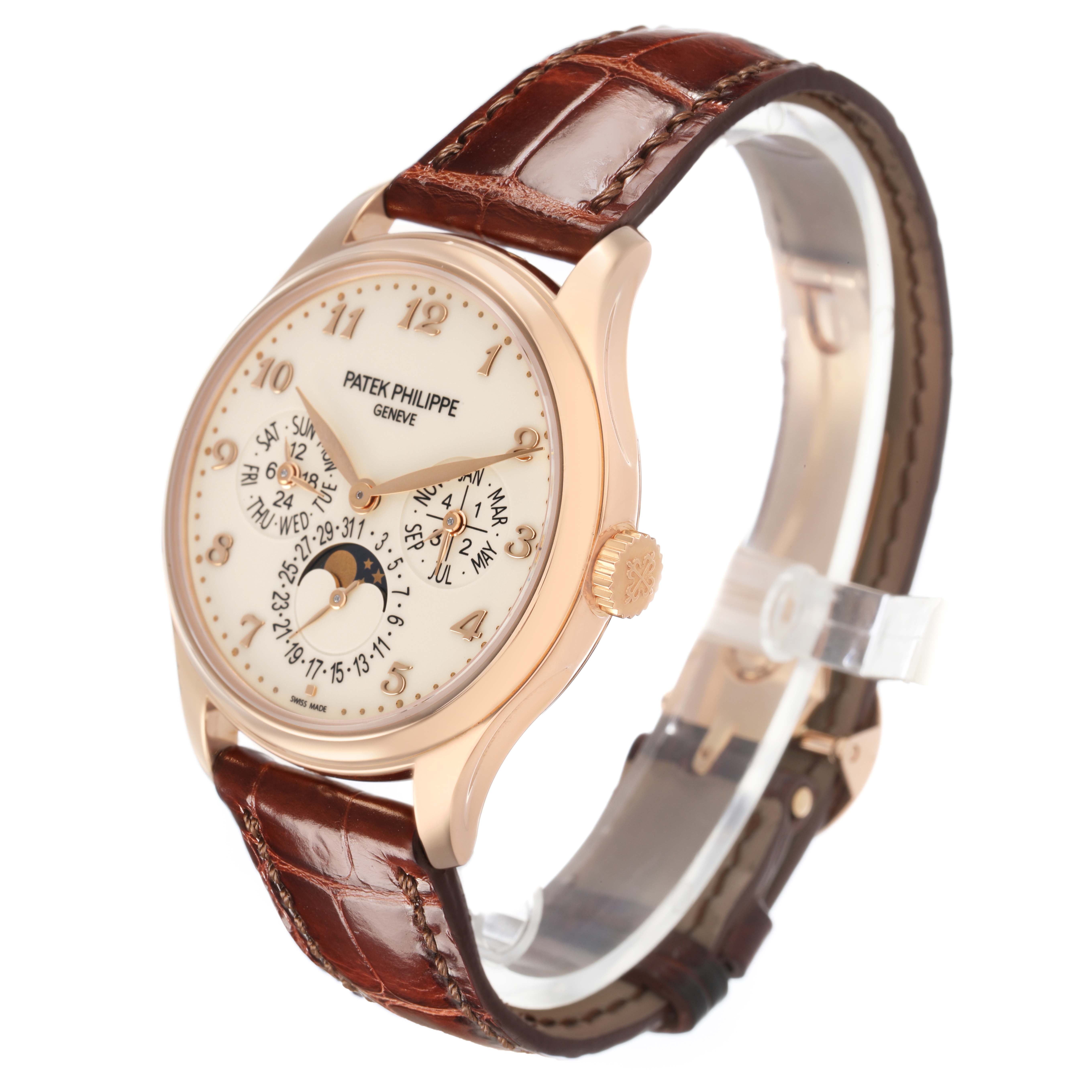 The Patek Philippe Complications 5327R Men's Rose Gold Beige Dial watch is shown at a three-quarter angle, displaying the face, crown, and leather strap.
