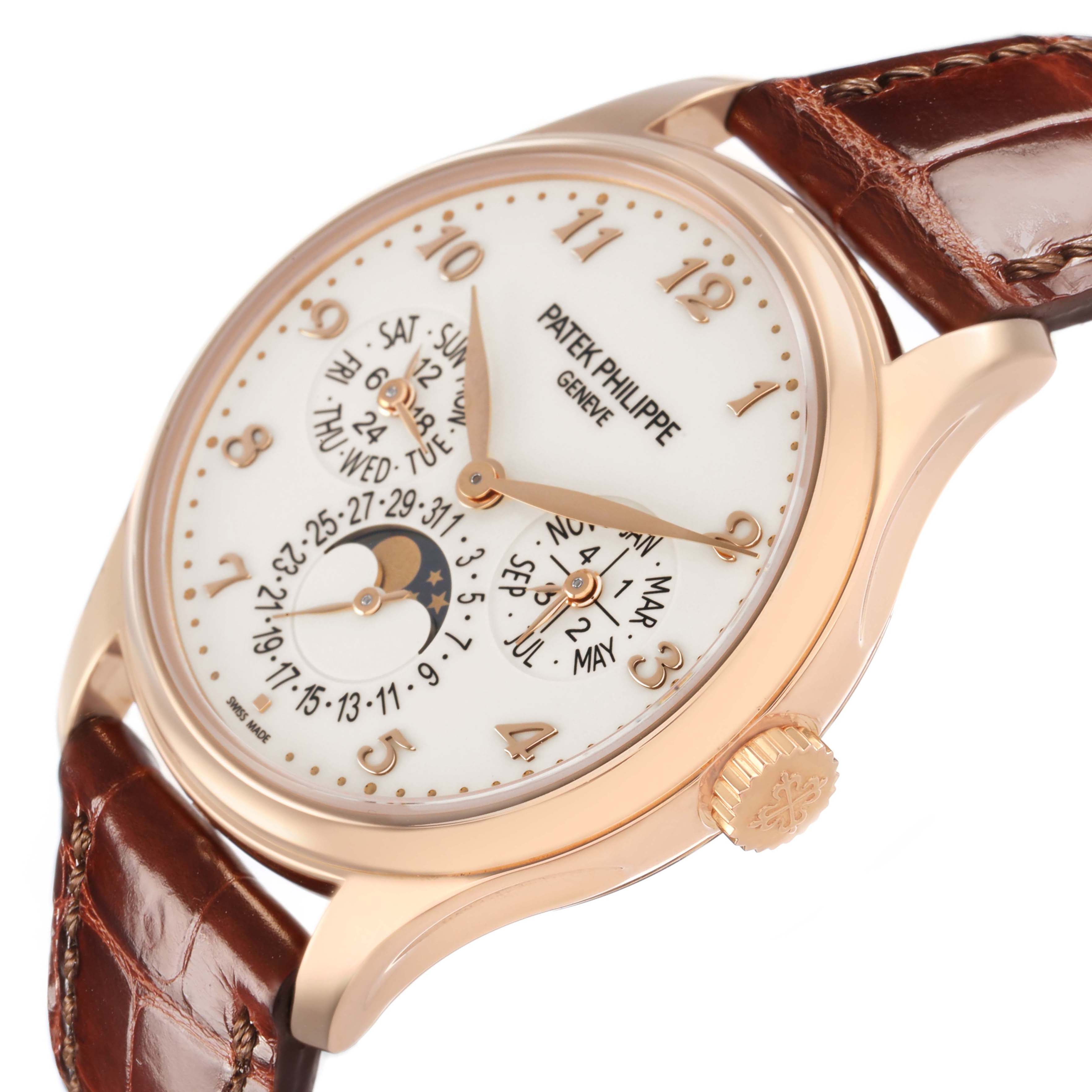 The Patek Philippe Complications 5327R Men's Rose Gold Beige Dial watch is shown from a side angle, highlighting the face, crown, and brown leather strap.