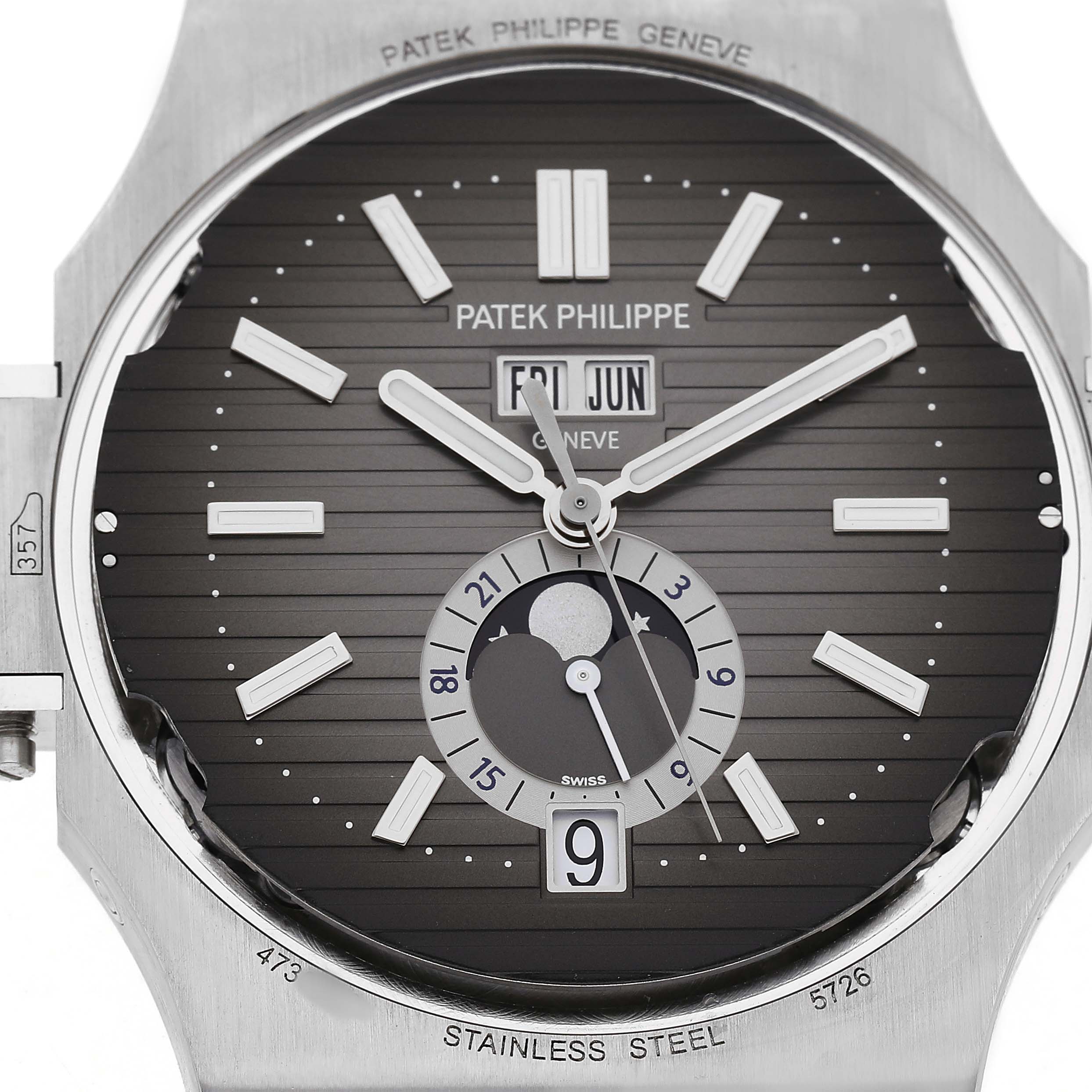 The image shows a close-up of the Patek Philippe Nautilus 5726 Men's Stainless Steel Grey Dial watch face, displaying the dial, moon phase, day, and date indicators.