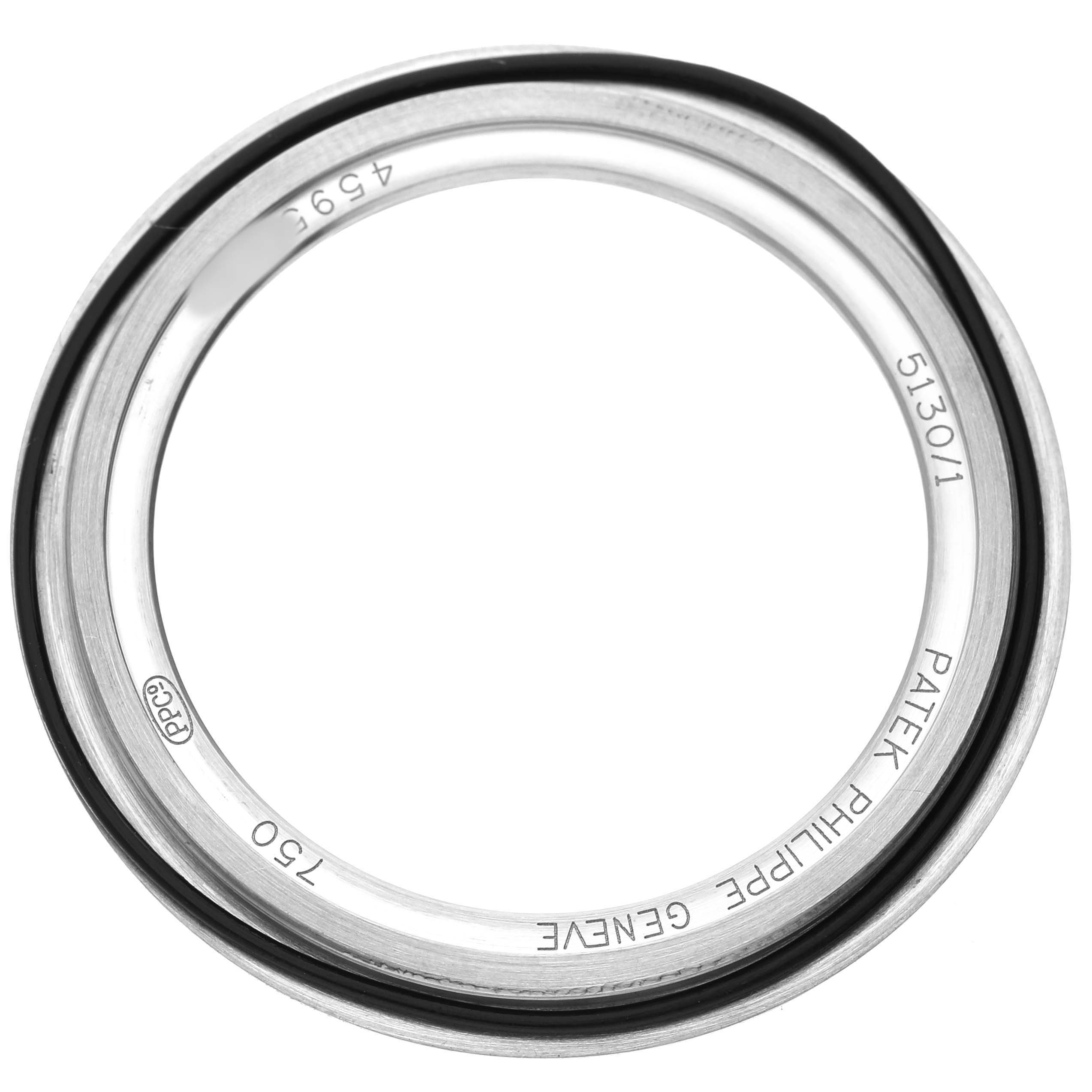 This image shows a bezel from a Patek Philippe Complications 5130G Men's White Gold Silver Dial model, viewed from a top angle.