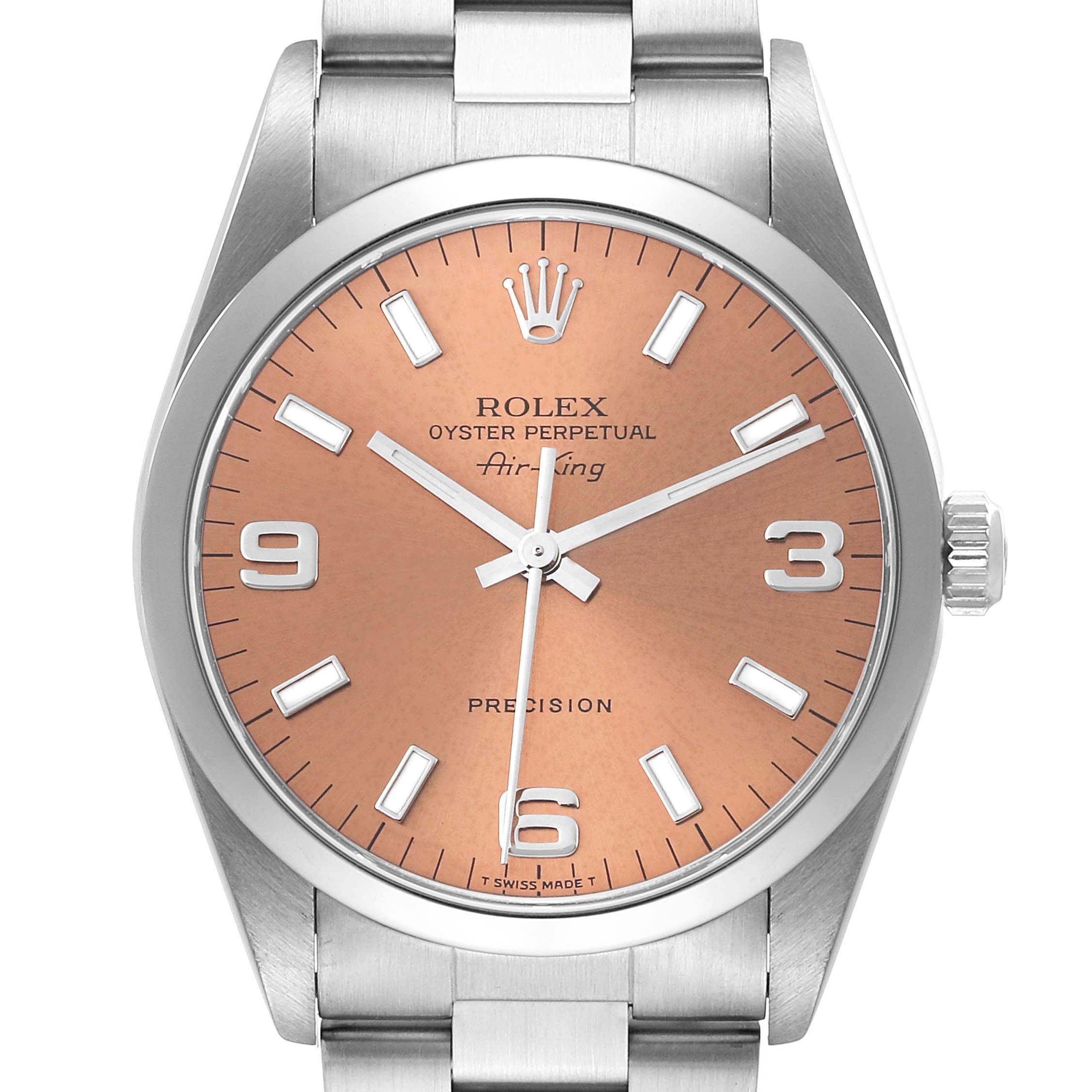 The image shows a front view of the Rolex Air-King 14000 Men's Stainless Steel Pink Dial 14000 Men's Stainless Steel Pink Dial watch, featuring its dial, hands, crown, and part of the bracelet.