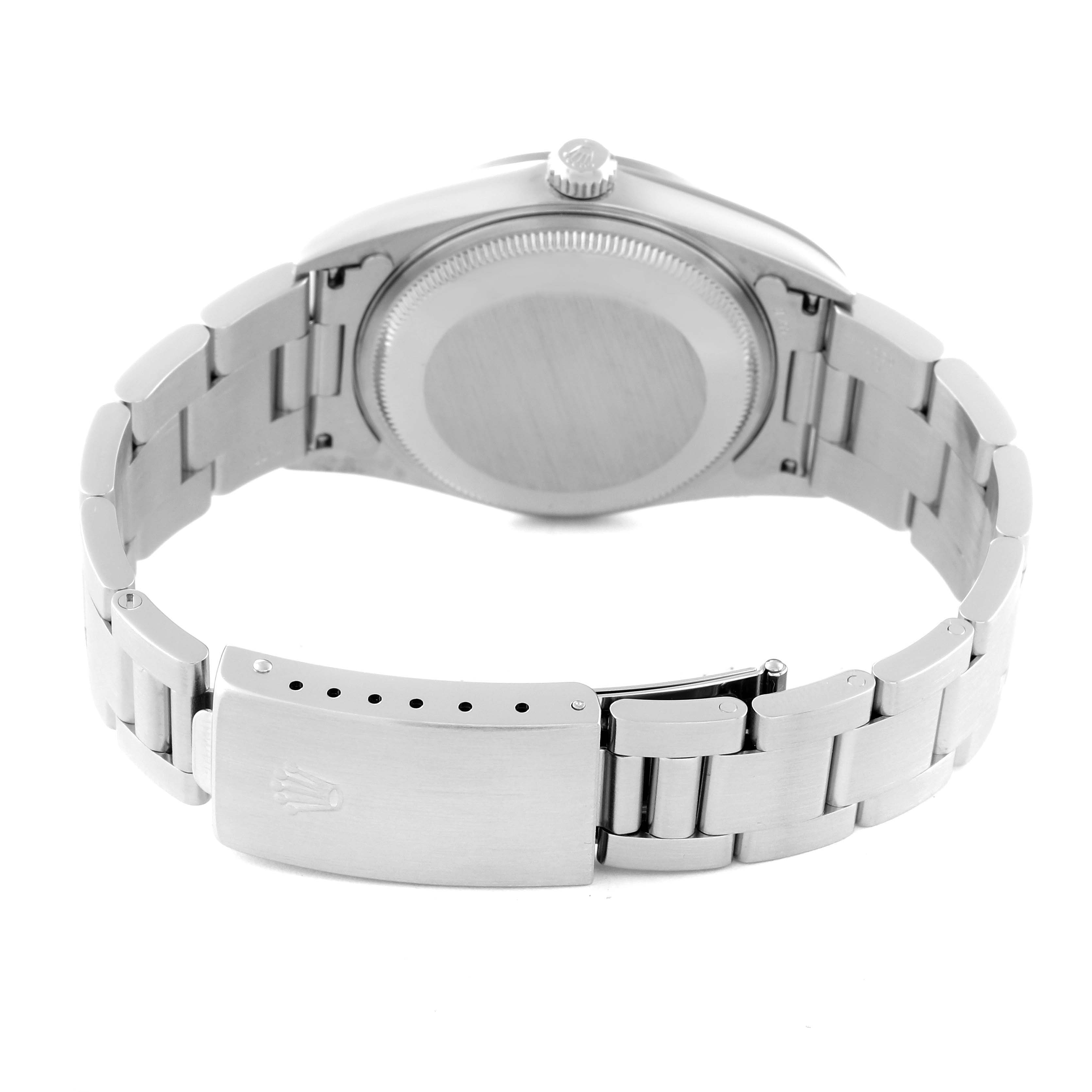The image shows the back view of a Rolex Air-King 14000 Men's Stainless Steel Blue Dial, highlighting the case back and bracelet clasp.