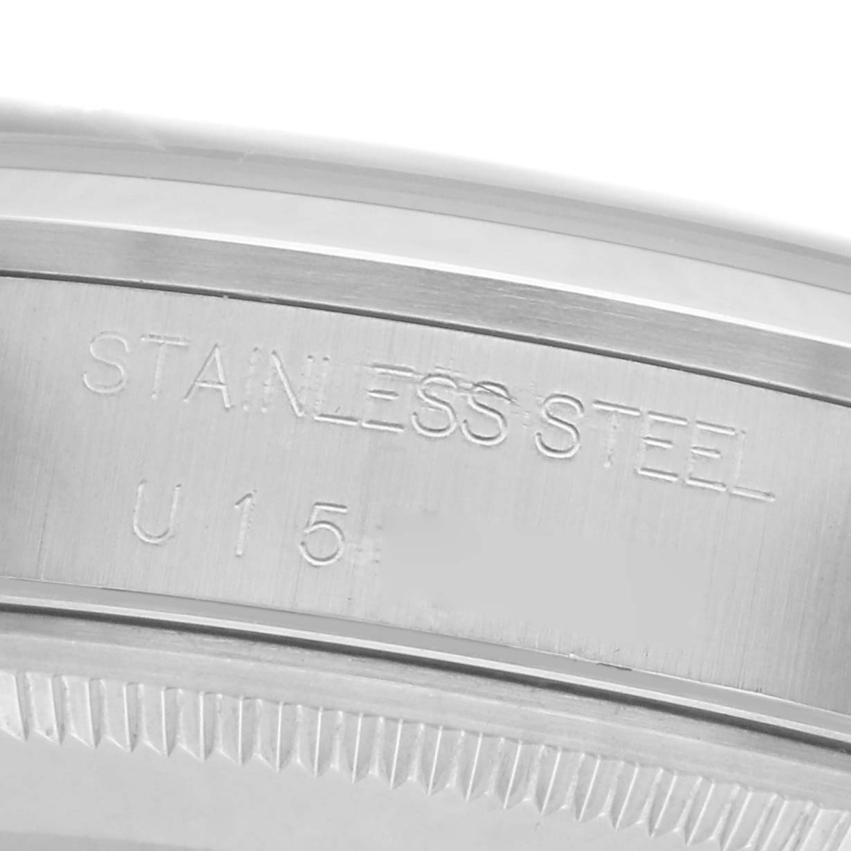 The image shows a close-up of the stainless steel case side engraving of a Rolex Air-King 14000 Men's Stainless Steel Silver Dial 14000 Men's Stainless Steel Silver Dial watch.