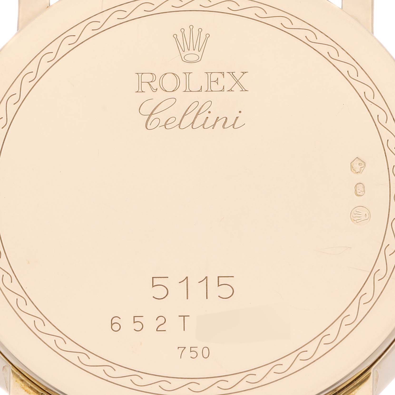 The image shows the back case of a Rolex Cellini 5115 Men's Yellow Gold Beige Dial 5115 Men's Yellow Gold Beige Dial watch, featuring the model number 5115 and other engravings.