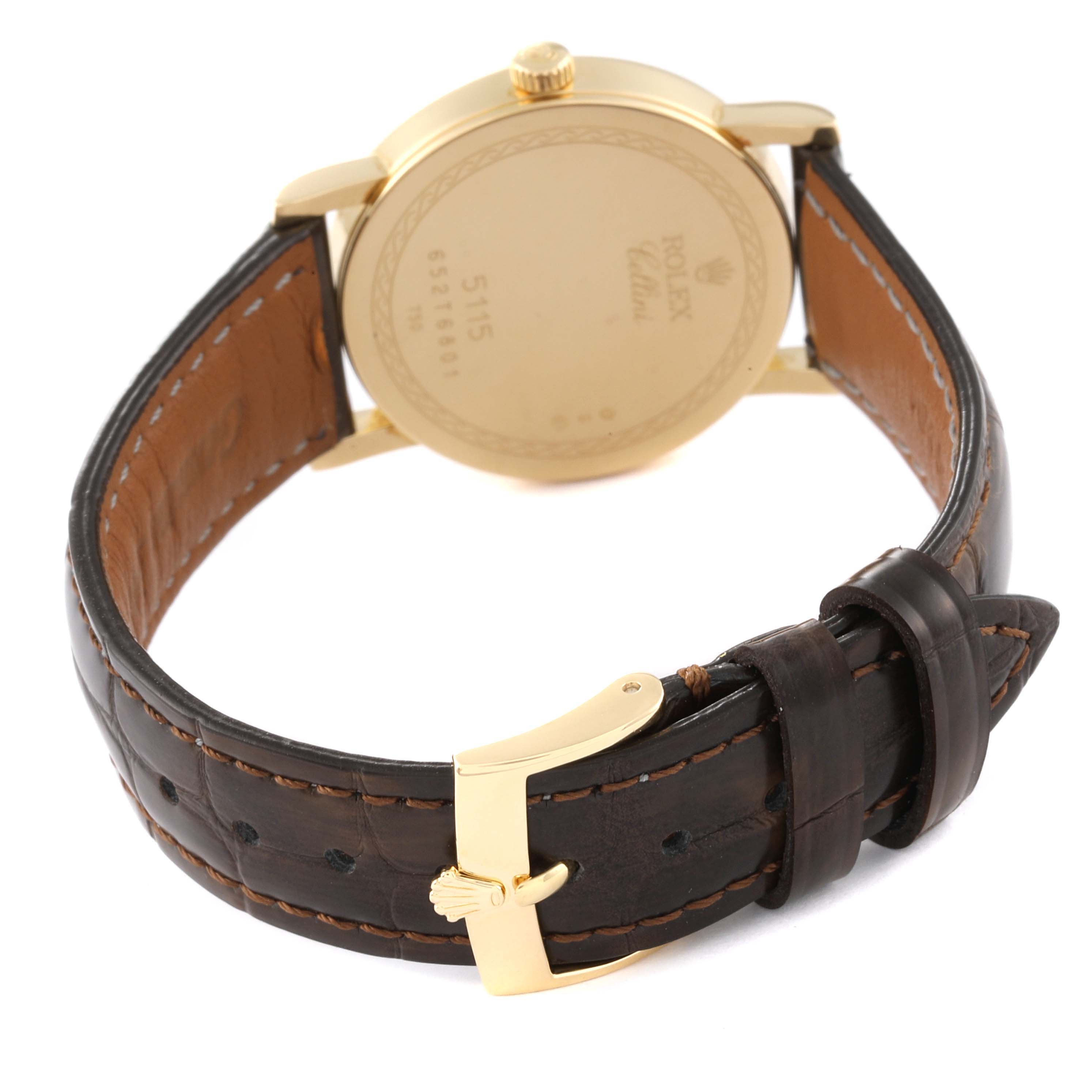 The image shows the back case, crown, and leather strap of a Rolex Cellini 5115 Men's Yellow Gold Beige Dial 5115 Men's Yellow Gold Beige Dial watch from a rear angle.