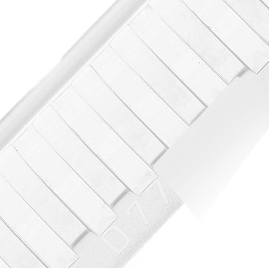 This is a close-up image showing the side of a metal bracelet link for a Rolex Cellini 5441 Men
s White Gold Silver Dial 5441 Men
s White Gold Silver Dial model watch.