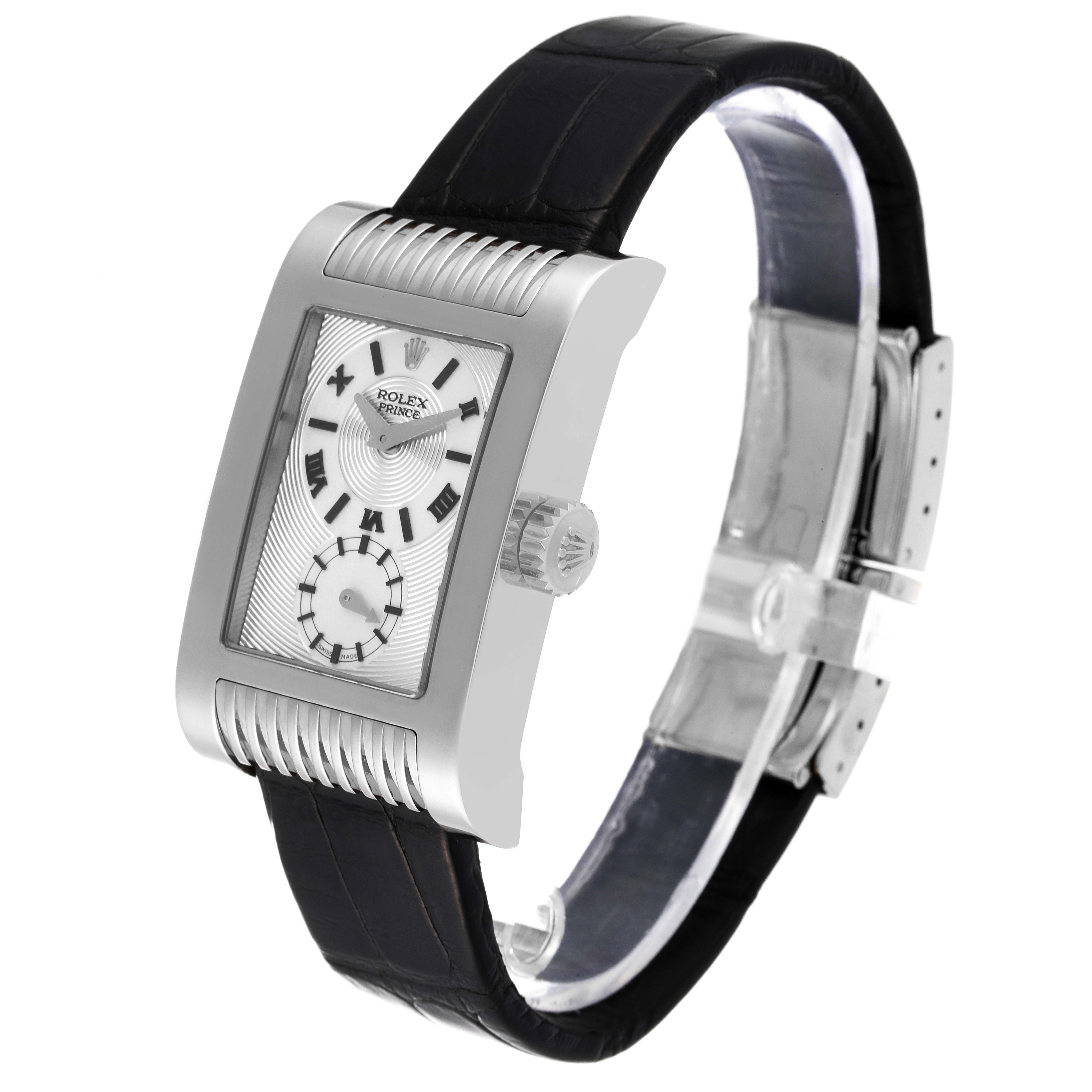 The image shows a Rolex Cellini 5441 Men
s White Gold Silver Dial 5441 Men
s White Gold Silver Dial watch at an angle highlighting its face, strap, and part of the buckle.