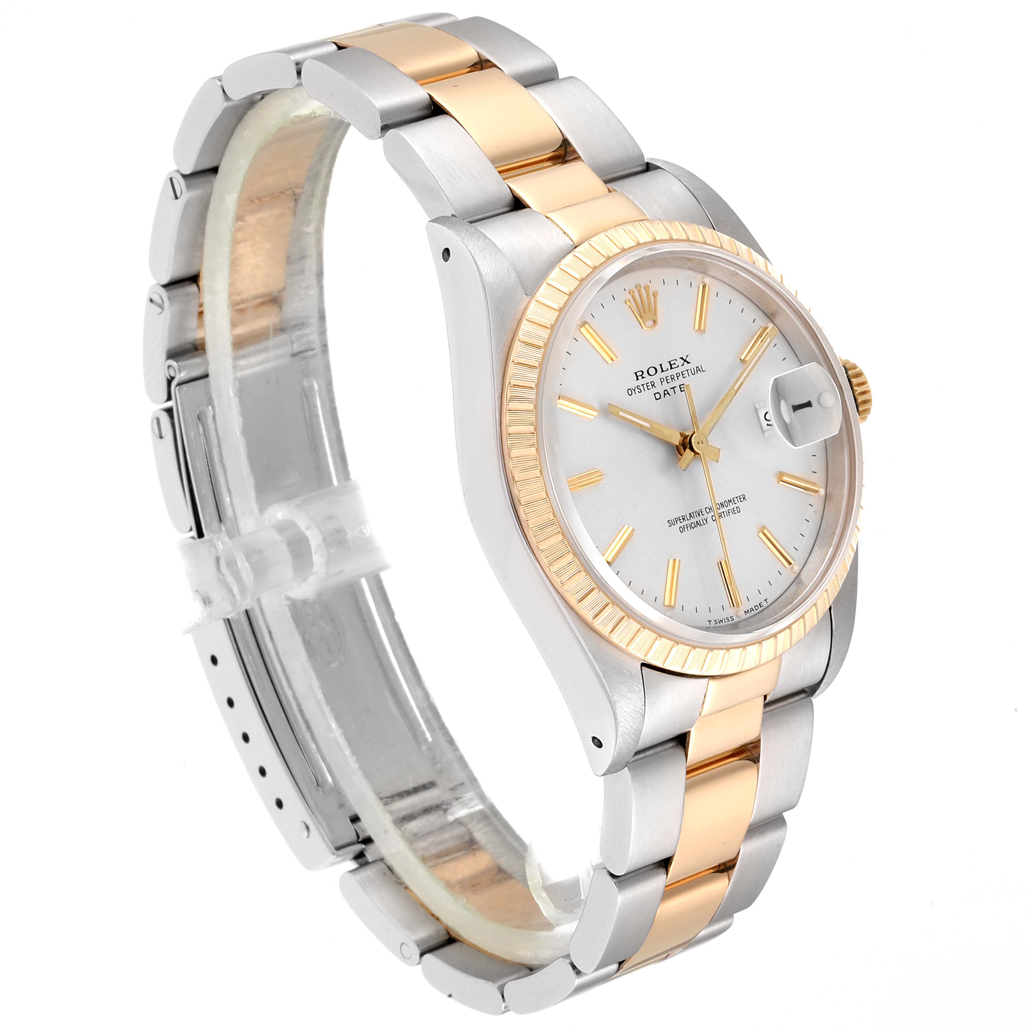 This image shows a Rolex Date 15223 Men's Steel and Gold (two tone) Silver Dial 15223 Men's Steel and Gold (two tone) Silver Dial watch at an angle highlighting the dial, case, bezel, and bracelet.