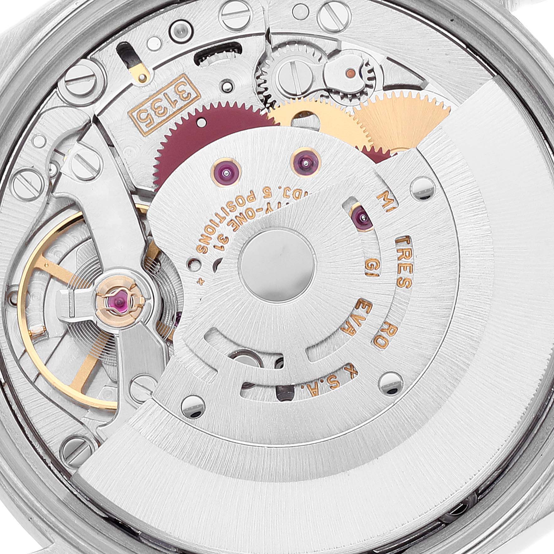 This image shows the internal mechanical movement of a Rolex Date 15210 Men's Stainless Steel Silver Dial 15210 Men's Stainless Steel Silver Dial model watch, highlighting gears, rotor, and other intricate components.