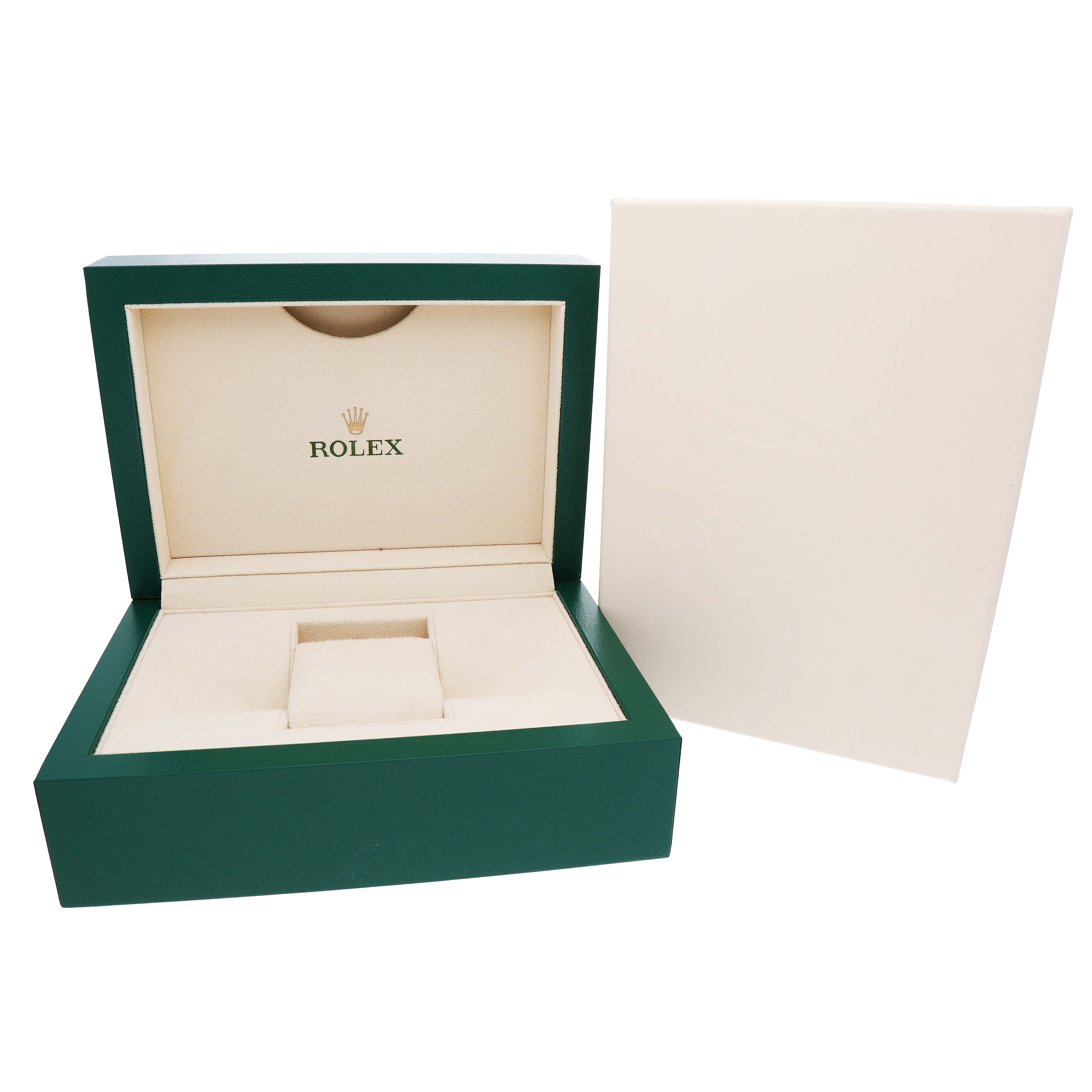 The image shows an open green Rolex Datejust 279160 Women's Stainless Steel White Dial watch box with a cream interior and a separate lid beside it.