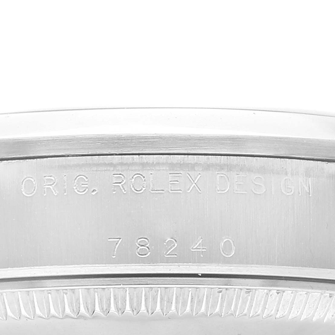 The image shows a close-up of the case side with the model number and "Orig. Rolex Design" engraving on a Mid-Size Rolex watch.