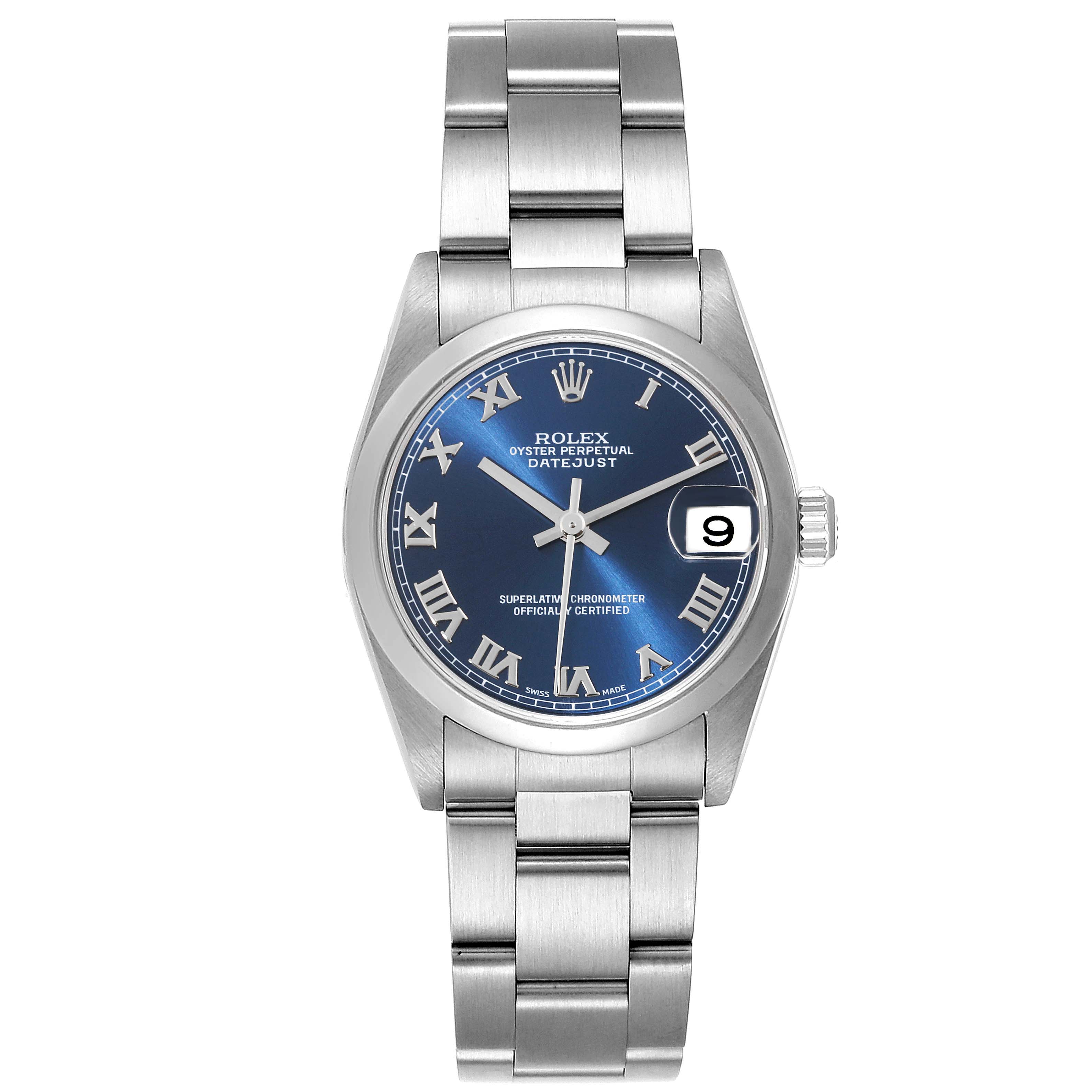 The image shows a front view of a Mid-Size Rolex Oyster Perpetual Datejust watch with a blue dial and Roman numerals.