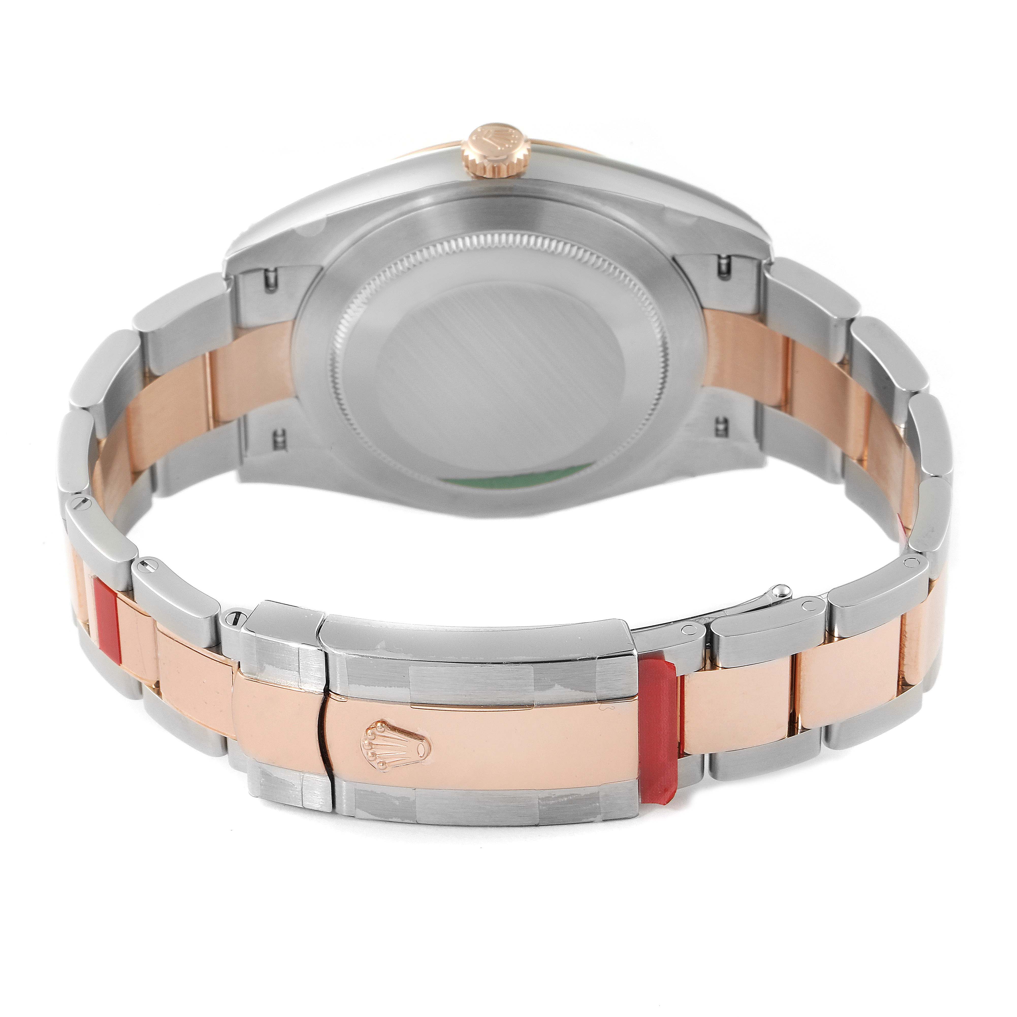 The image shows the rear view of a Rolex Datejust 41 126301 Men's Steel and Gold (two tone) Grey Dial 126301 Men's Steel and Gold (two tone) Grey Dial watch, focusing on the case back, crown, and the two-tone bracelet with the clasp.