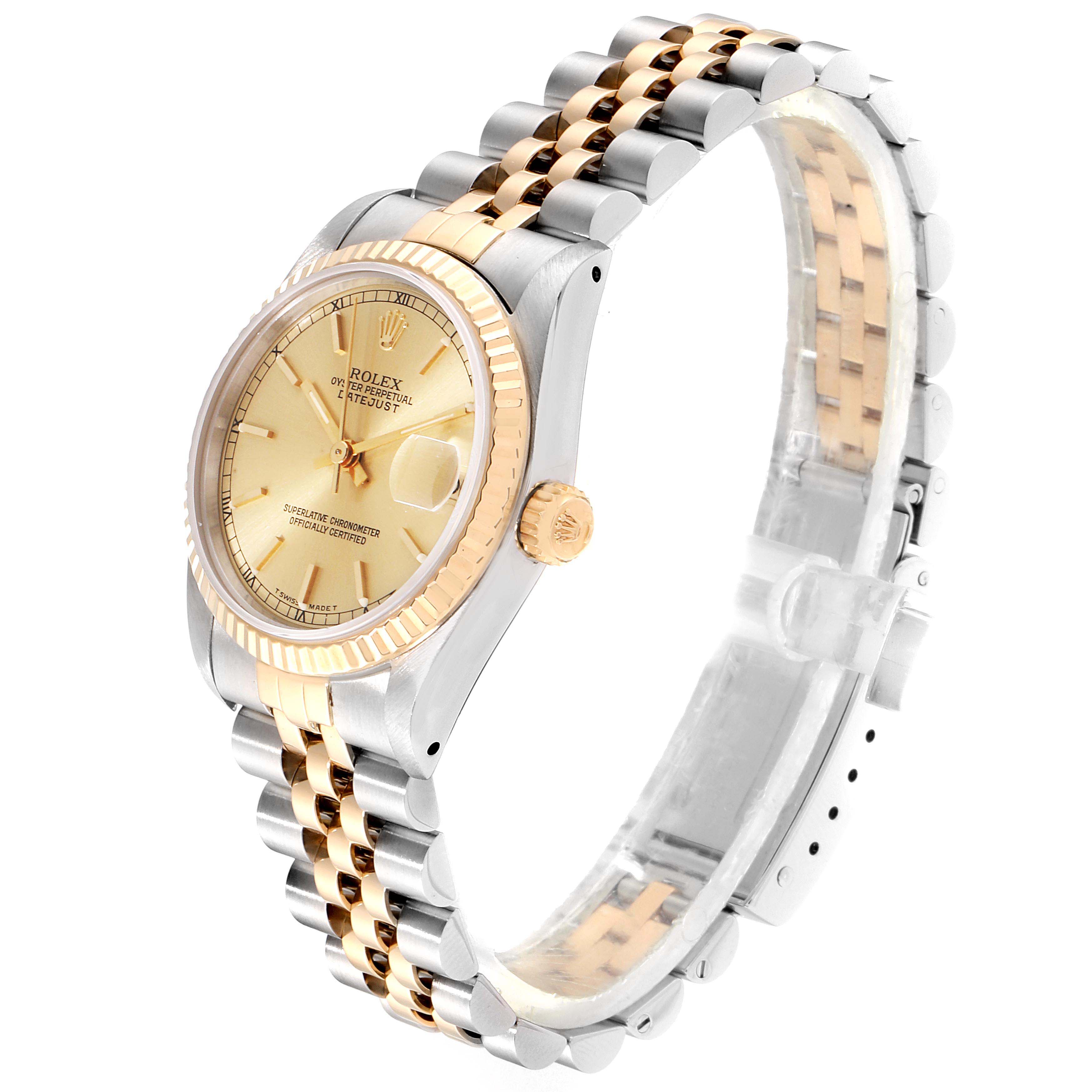 The Rolex Datejust 68273 Women
s Steel and Gold (two tone) Champagne Dial 68273 Women
s Steel and Gold (two tone) Champagne Dial watch is shown at a slight angle, displaying the bezel, face, crown, and Jubilee bracelet.