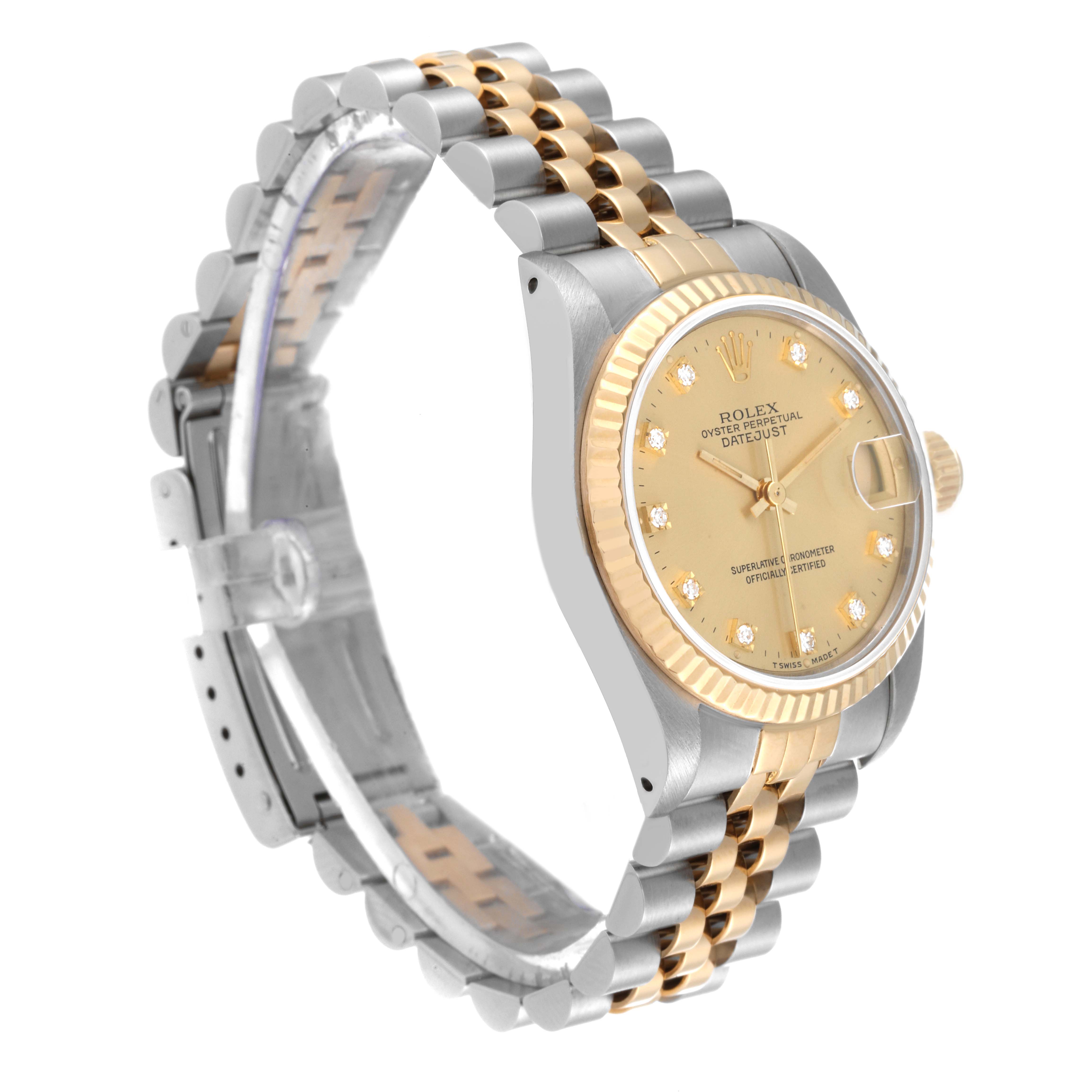 The image shows a side view of the Rolex Mid-Size 68273 Women
s Steel and Gold (two tone) Champagne Dial 68273 Women
s Steel and Gold (two tone) Champagne Dial Oyster Perpetual Datejust, highlighting the dial, case, and Jubilee bracelet.