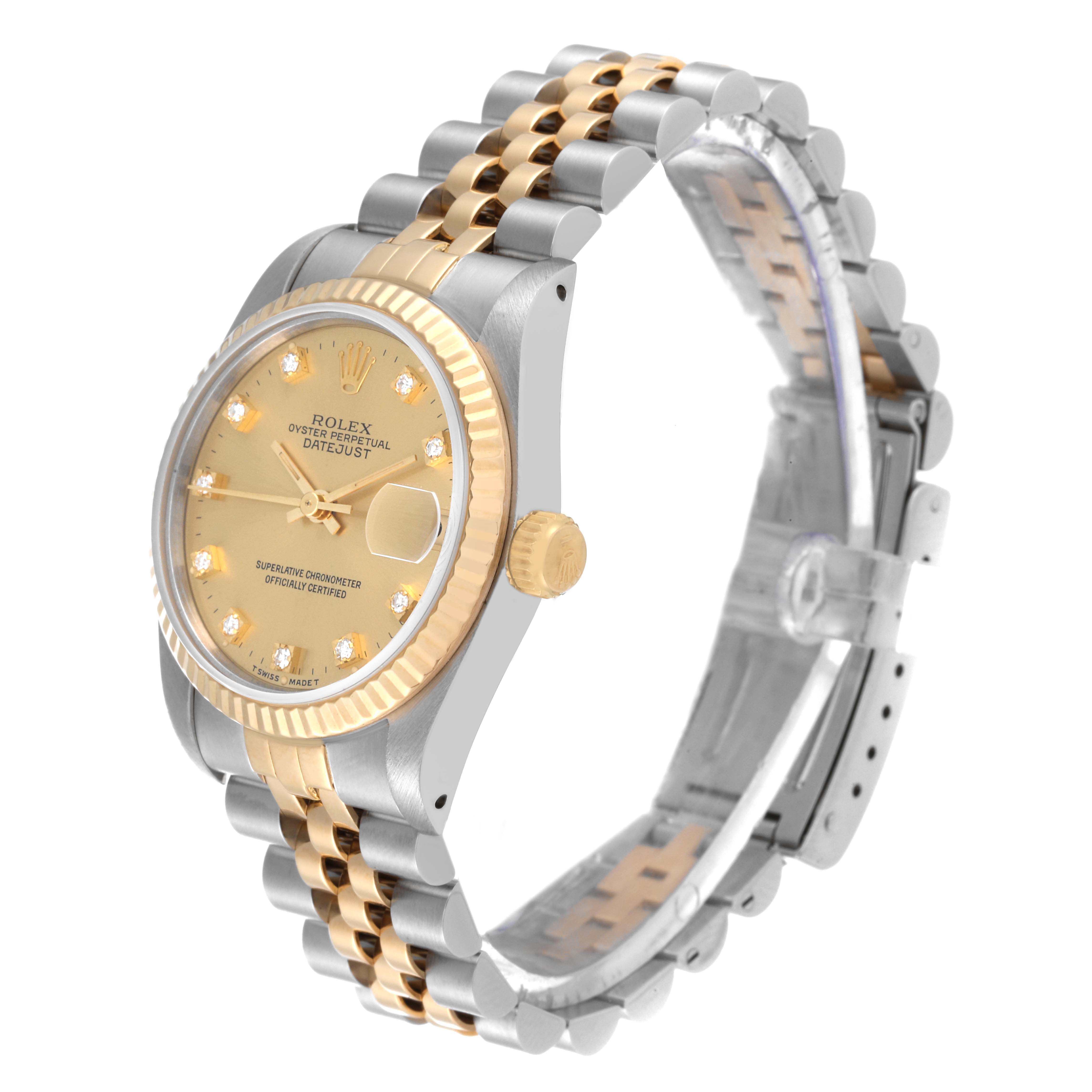The image shows a side angle of the Rolex Mid-Size 68273 Women
s Steel and Gold (two tone) Champagne Dial 68273 Women
s Steel and Gold (two tone) Champagne Dial Oyster Perpetual Datejust watch, highlighting the dial, bezel, and bracelet.