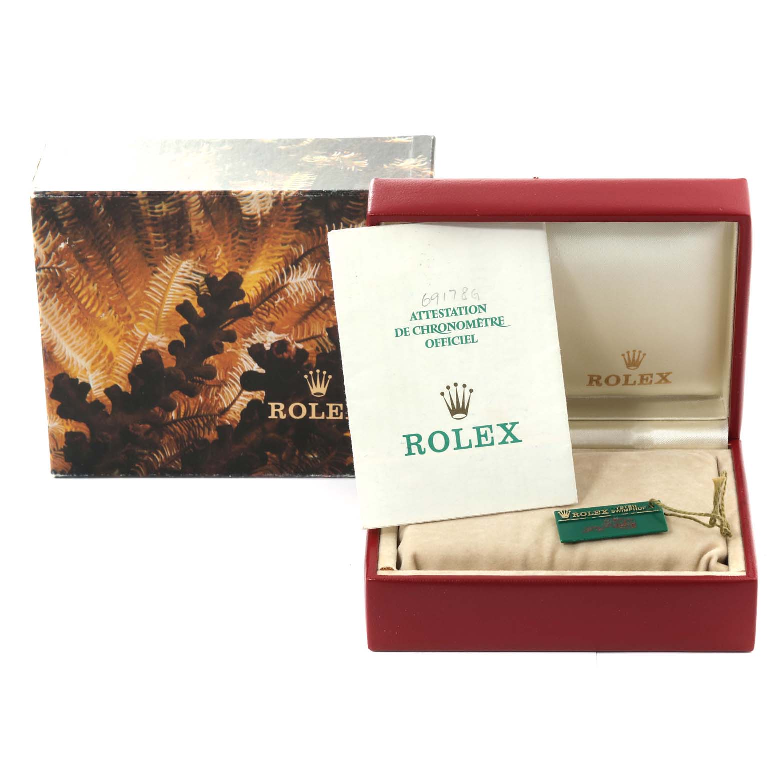 The image shows a Rolex President 69178 Women
s Yellow Gold Champagne Dial 69178 Women
s Yellow Gold Champagne Dial model watch box, open with its certificate and tag visible, next to the outer packaging.