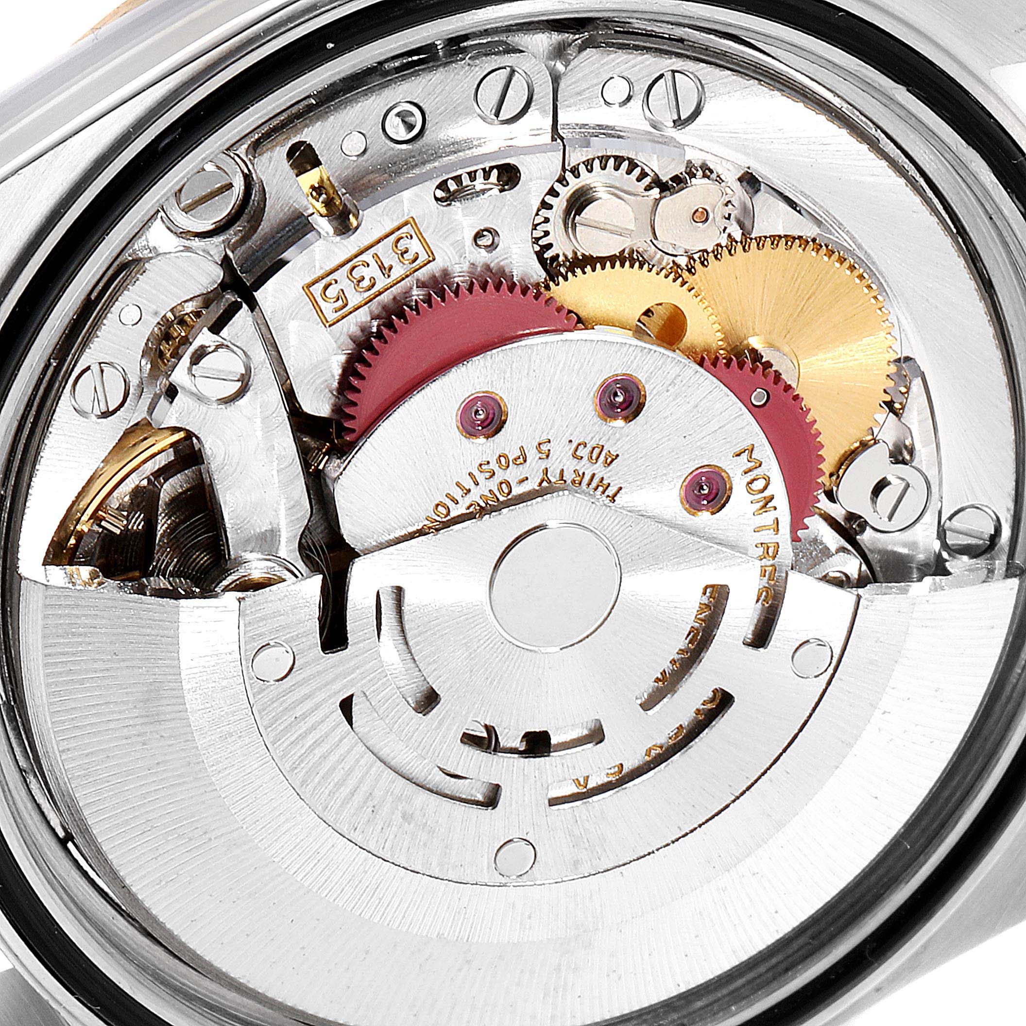 The image shows an open case back view of the Rolex Datejust 16233 Men
s Steel and Gold (two tone) Champagne Dial 16233 Men
s Steel and Gold (two tone) Champagne Dial model, revealing its internal movement mechanics.