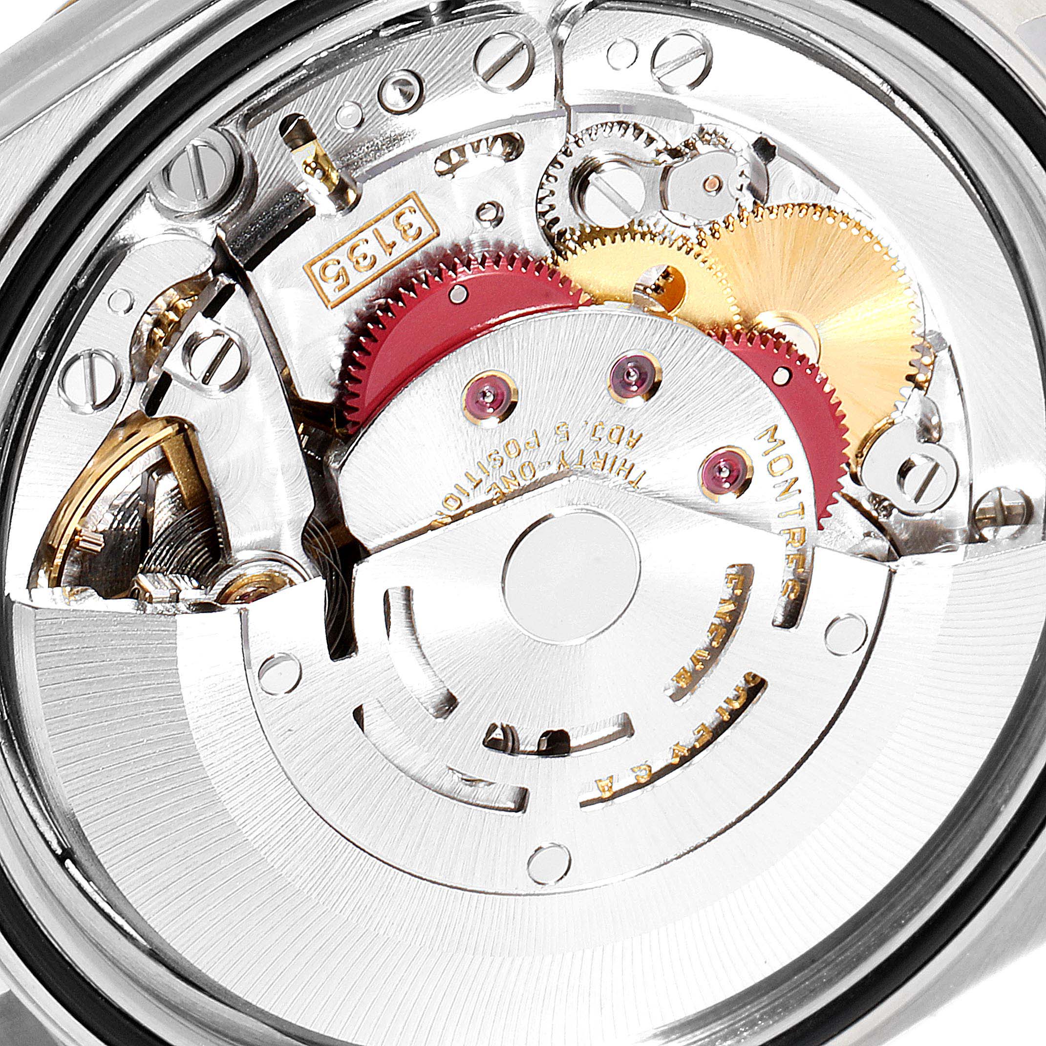 This image shows a close-up view of the movement mechanism of a Rolex Datejust 16233 Men
s Steel and Gold (two tone) Champagne Dial 16233 Men
s Steel and Gold (two tone) Champagne Dial watch.