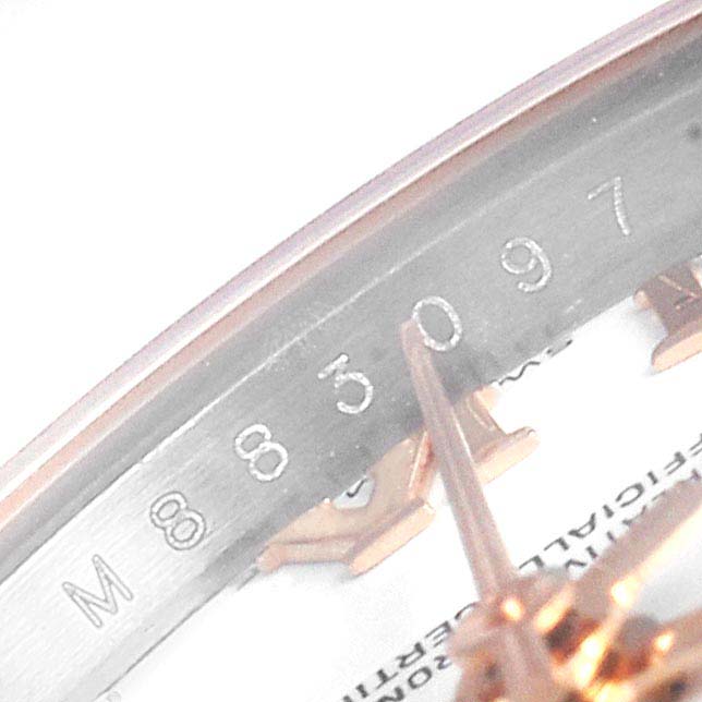 The image shows a partial close-up of the serial number on a Rolex Datejust 179161 Women
s Steel and Gold (two tone) White Dial 179161 Women
s Steel and Gold (two tone) White Dial model.