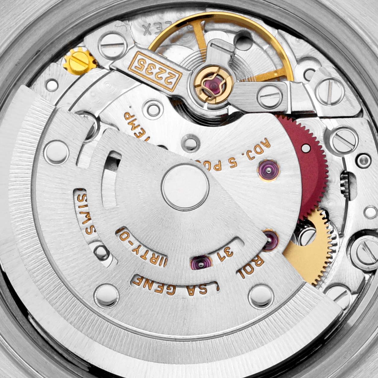 The image shows a close-up of the Rolex Datejust 79174 Women's Stainless Steel Black Dial 79174 Women's Stainless Steel Black Dial's movement, highlighting its intricate mechanical parts.