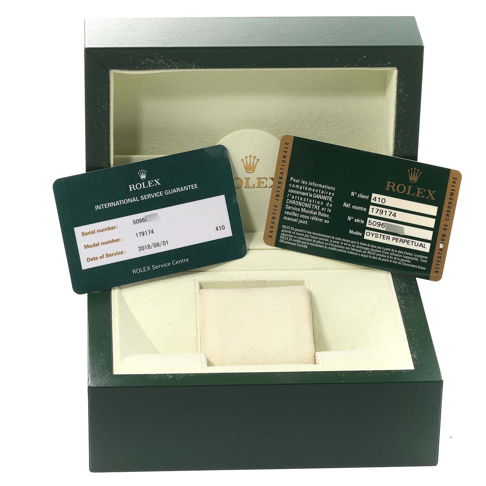 The image shows an open Rolex Datejust 179174 Women's Stainless Steel Pink Dial 179174 Women's Stainless Steel Pink Dial watch box with warranty cards displayed inside.