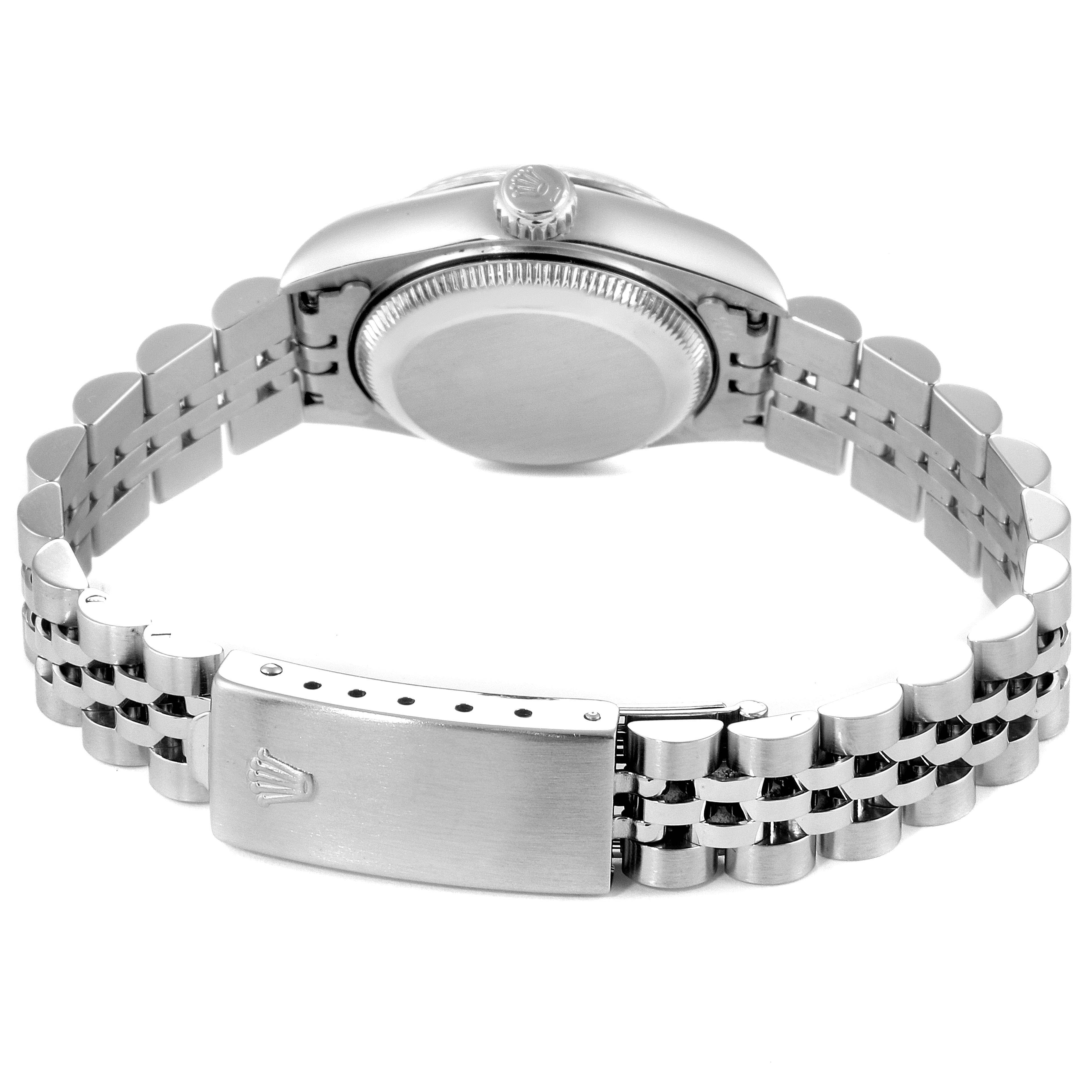The image shows the back view of a Rolex Datejust 69174  Women
s Stainless Steel White Dial 69174  Women
s Stainless Steel White Dial watch, highlighting the clasp and bracelet.