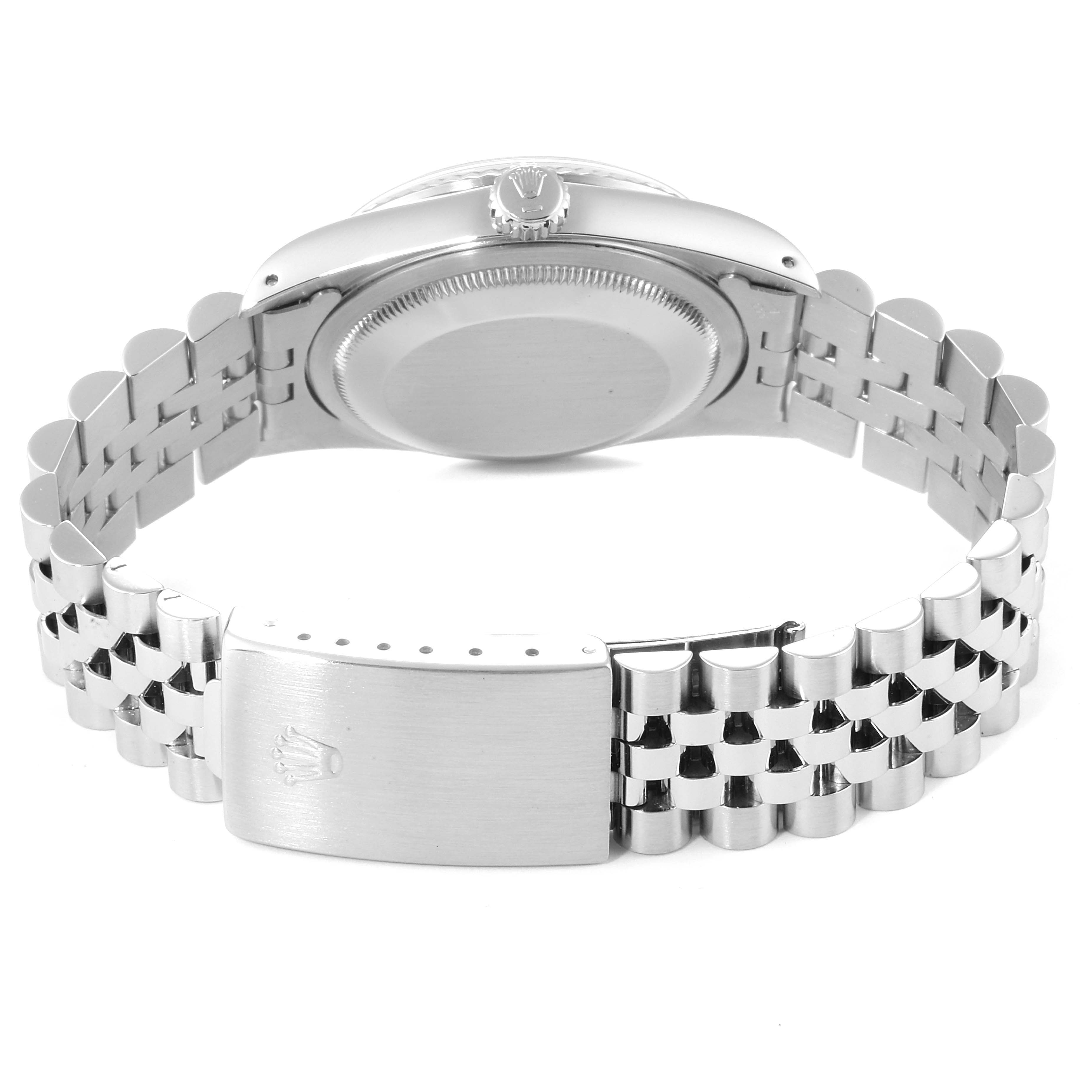 The image shows the backside of a Rolex Datejust 16234 Men's Stainless Steel Silver Dial 16234 Men's Stainless Steel Silver Dial watch, highlighting its case back and Jubilee bracelet.