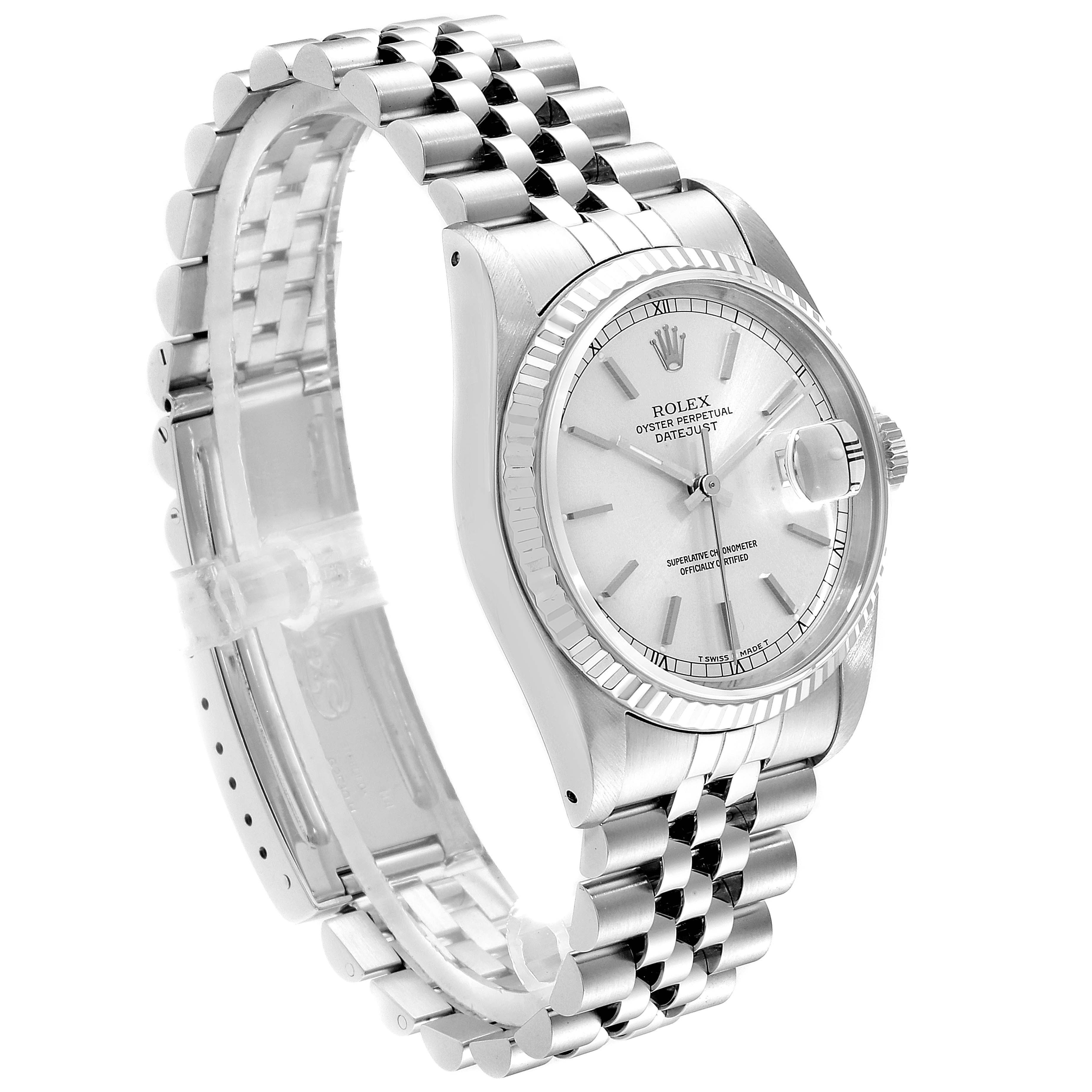 The image shows a Rolex Datejust 16234 Men's Stainless Steel Silver Dial 16234 Men's Stainless Steel Silver Dial model watch from a three-quarter angle, displaying its face, fluted bezel, and Jubilee bracelet.