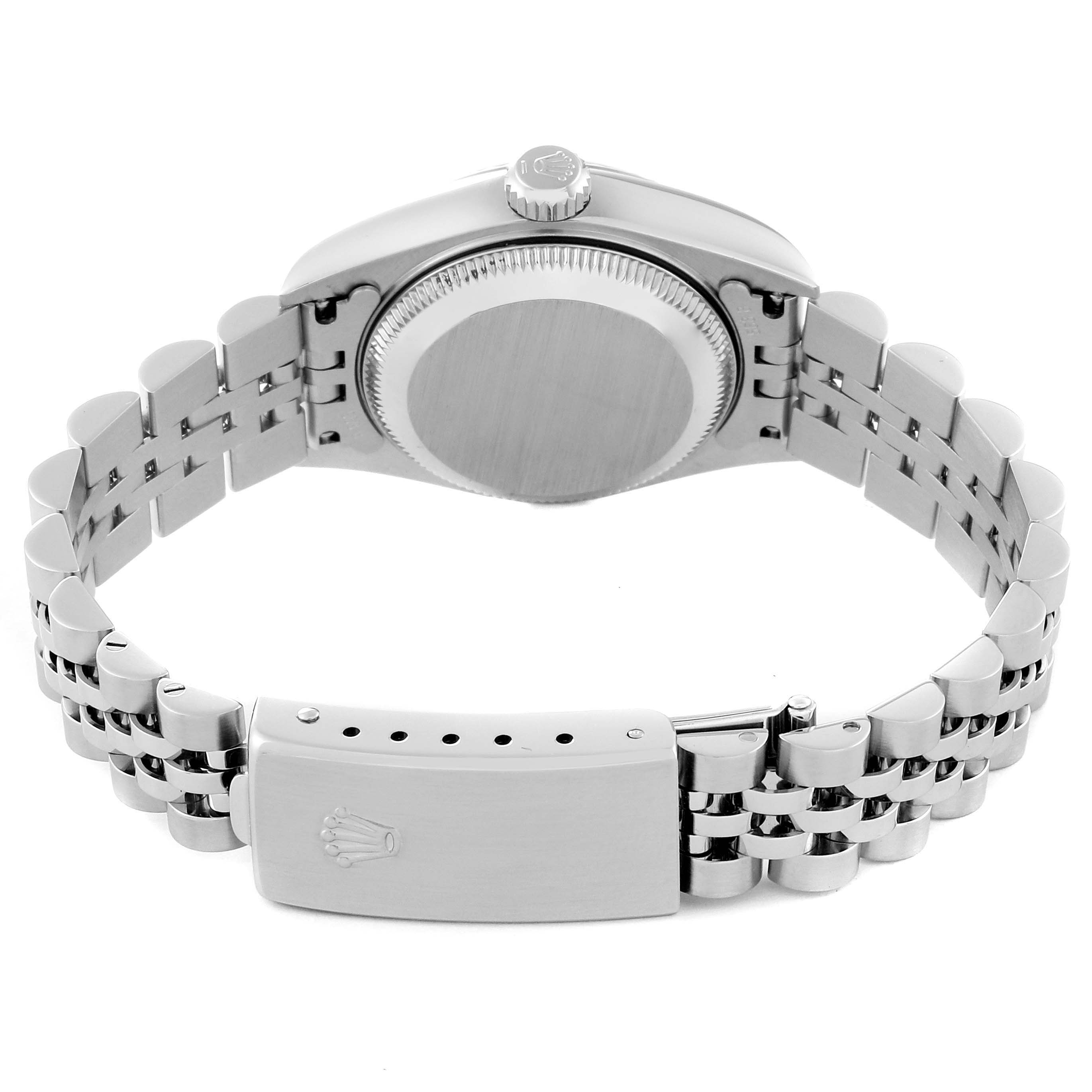 This image shows the back of a Rolex Datejust 79174 Women's Stainless Steel Silver Dial 79174 Women's Stainless Steel Silver Dial watch, highlighting its stainless steel case, crown, and Jubilee bracelet with clasp.