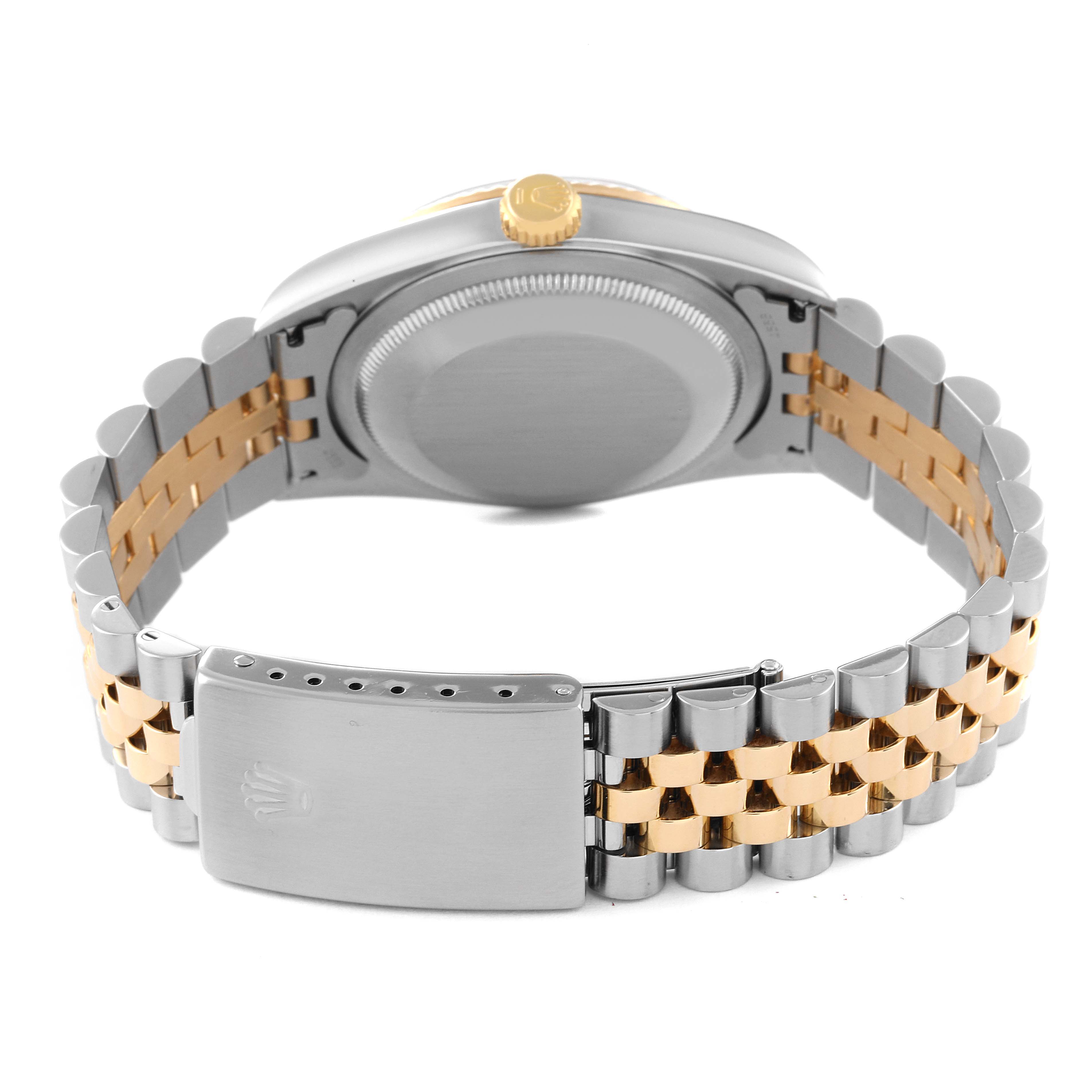 This image shows the back view of a Rolex Datejust 16233 Men's Steel and Gold (two tone) Black Dial 16233 Men's Steel and Gold (two tone) Black Dial watch, highlighting the case back and the two-tone Jubilee bracelet with the clasp.