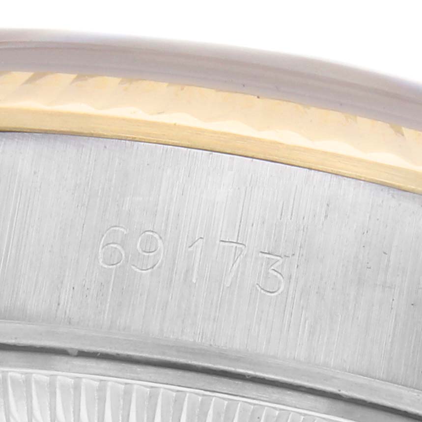The image shows a close-up of the outer side of the bezel and the mid-case of a Rolex Datejust 69173 Women's Steel and Gold (two tone) Champagne Dial 69173 Women's Steel and Gold (two tone) Champagne Dial, highlighting the model number.