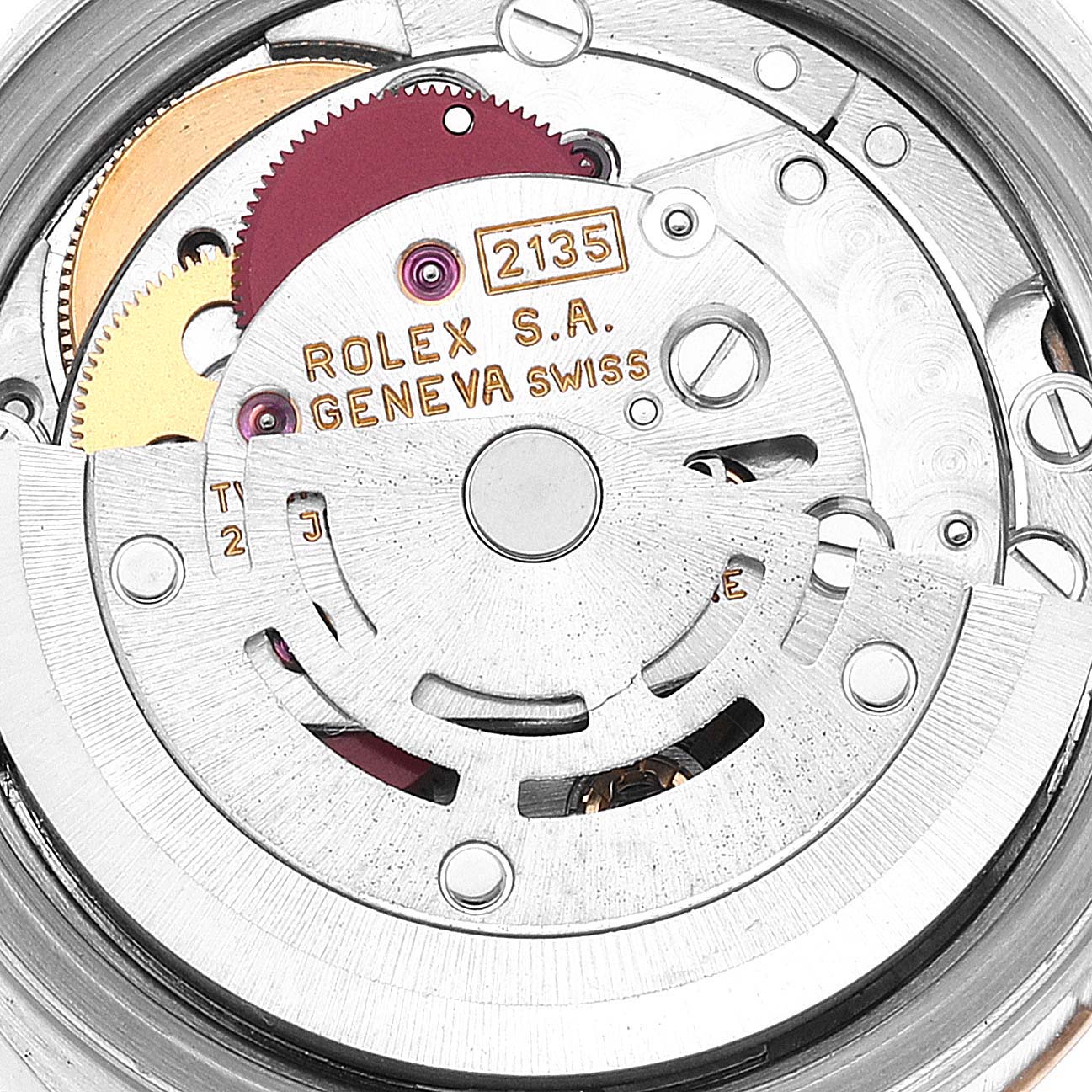 This image shows the inner mechanical movement of a Rolex Datejust 69173 Women's Steel and Gold (two tone) Champagne Dial 69173 Women's Steel and Gold (two tone) Champagne Dial watch, specifically the rotor and gear components.