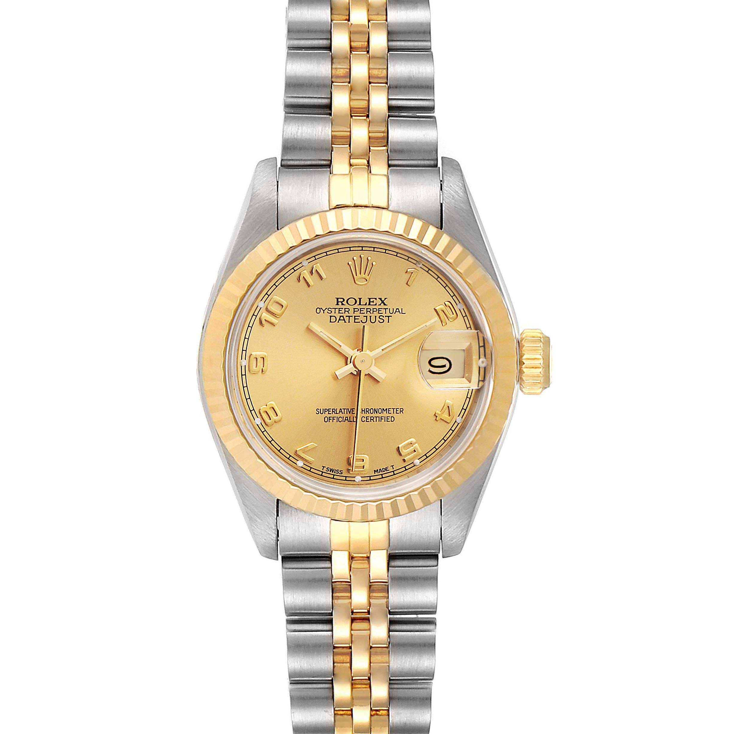 The image shows a Rolex Datejust 69173 Women
s Steel and Gold (two tone) Champagne Dial 69173 Women
s Steel and Gold (two tone) Champagne Dial watch from a front angle, displaying its two-tone bracelet, fluted bezel, dial, and date window.