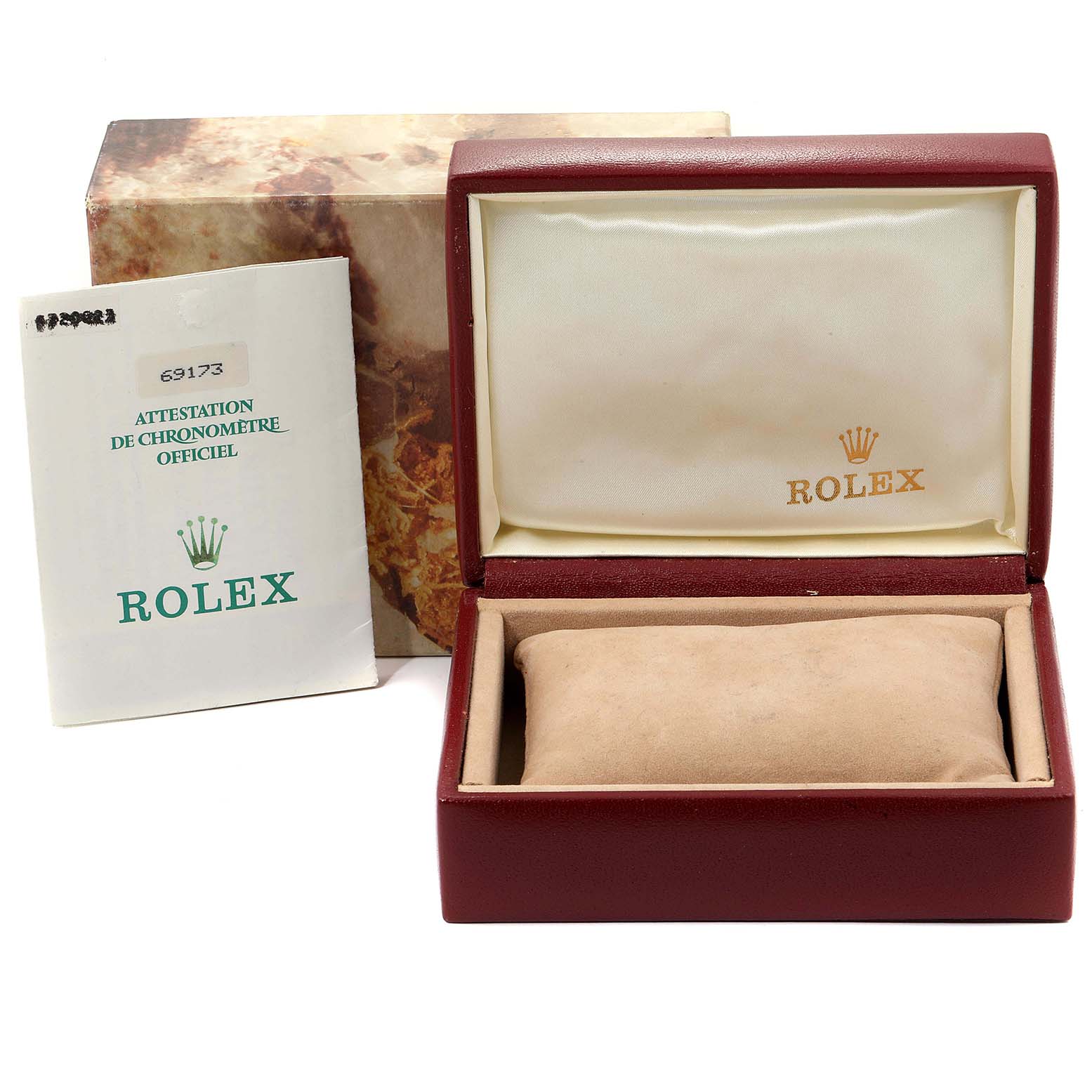This image shows the packaging, cushion, and official documentation for a Rolex Datejust 69173 Women
s Steel and Gold (two tone) Champagne Dial 69173 Women
s Steel and Gold (two tone) Champagne Dial model watch.