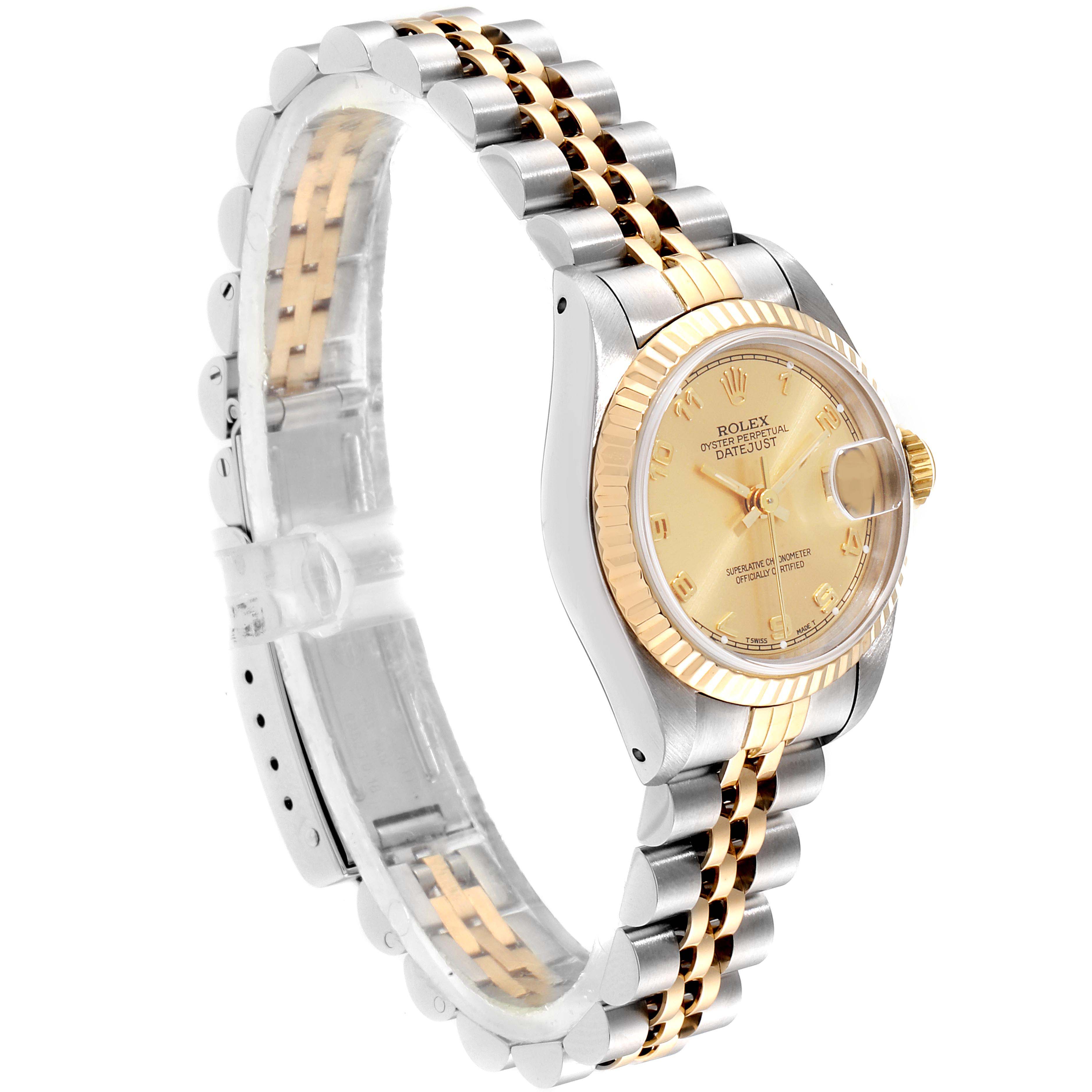 This Rolex Datejust 69173 Women
s Steel and Gold (two tone) Champagne Dial 69173 Women
s Steel and Gold (two tone) Champagne Dial watch is shown at a side angle, revealing its dial, bezel, and two-tone bracelet.