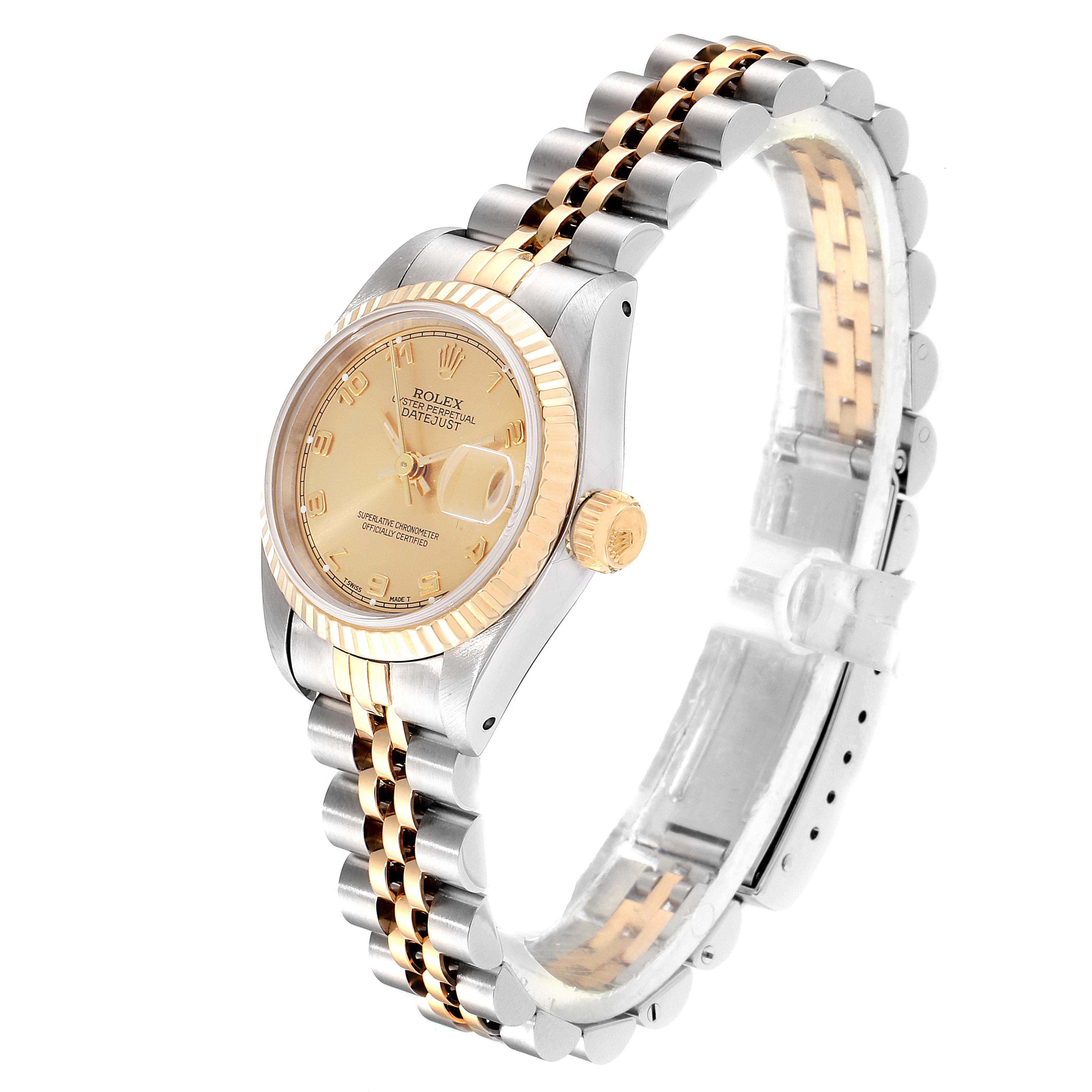 This image shows the Rolex Datejust 69173 Women
s Steel and Gold (two tone) Champagne Dial 69173 Women
s Steel and Gold (two tone) Champagne Dial watch at an angle highlighting the face, bezel, crown, and bracelet.