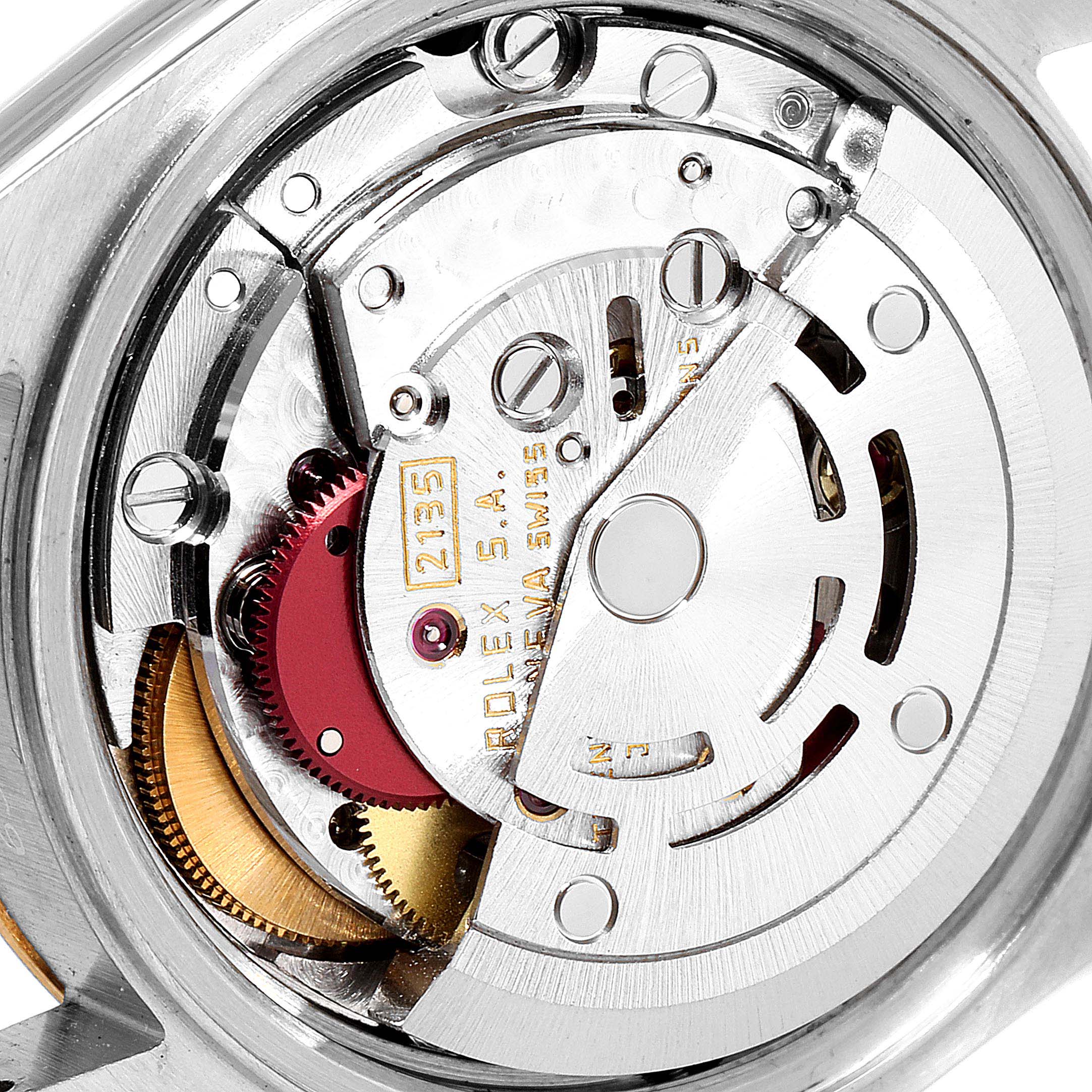 The image shows a close-up of the movement mechanism inside a Rolex Datejust 69173 Women
s Steel and Gold (two tone) Champagne Dial 69173 Women
s Steel and Gold (two tone) Champagne Dial watch.