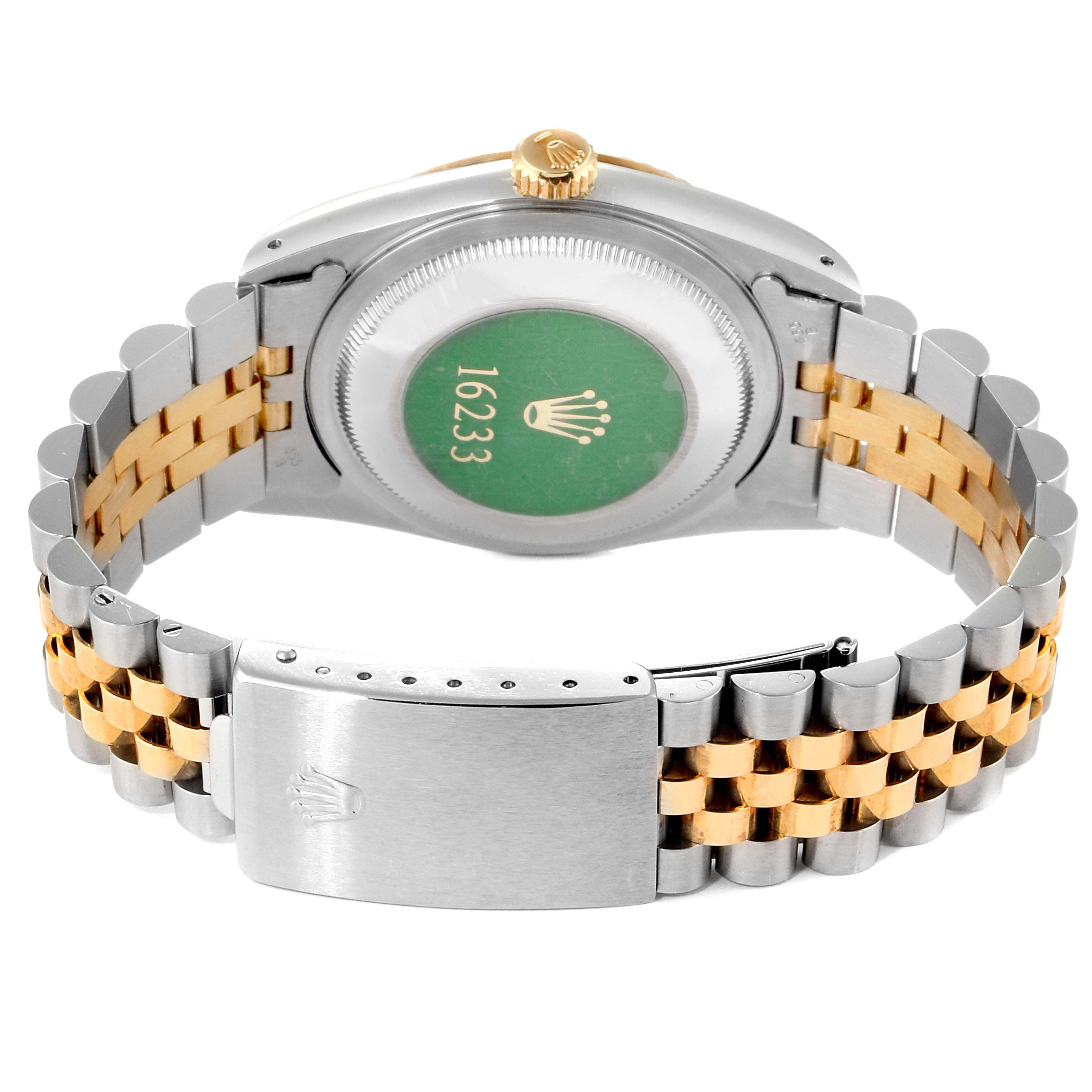 The image shows the back and bracelet of the Rolex Datejust 16233 Men
s Steel and Gold (two tone) Silver Dial 16233 Men
s Steel and Gold (two tone) Silver Dial 16233 model.