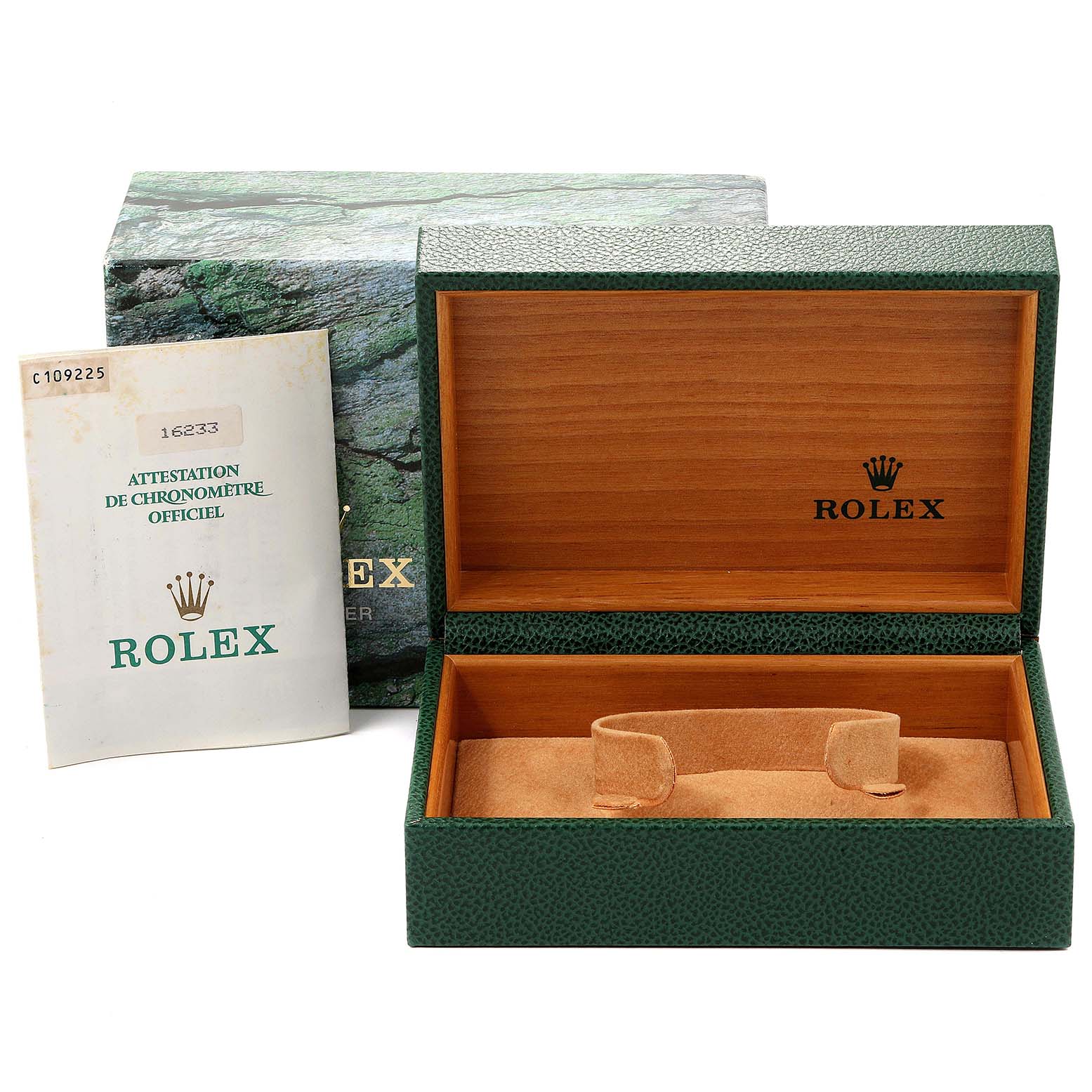 The image shows the opened packaging box and official certificate for a Rolex Datejust 16233 Men
s Steel and Gold (two tone) Silver Dial 16233 Men
s Steel and Gold (two tone) Silver Dial watch.