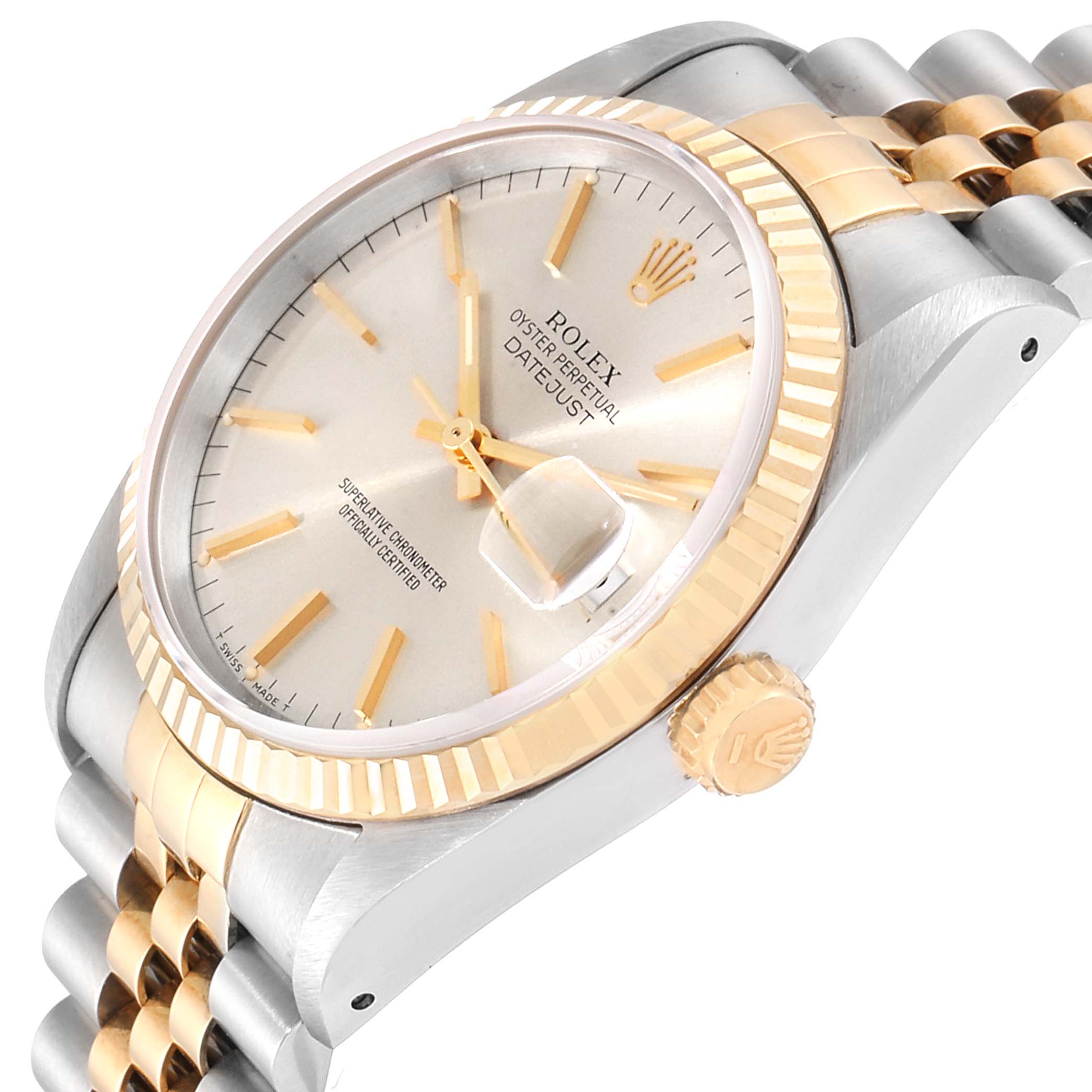 This image shows a close-up view of a Rolex Datejust 16233 Men
s Steel and Gold (two tone) Silver Dial 16233 Men
s Steel and Gold (two tone) Silver Dial watch at a slight angle, highlighting the face, bezel, crown, and part of the bracelet.