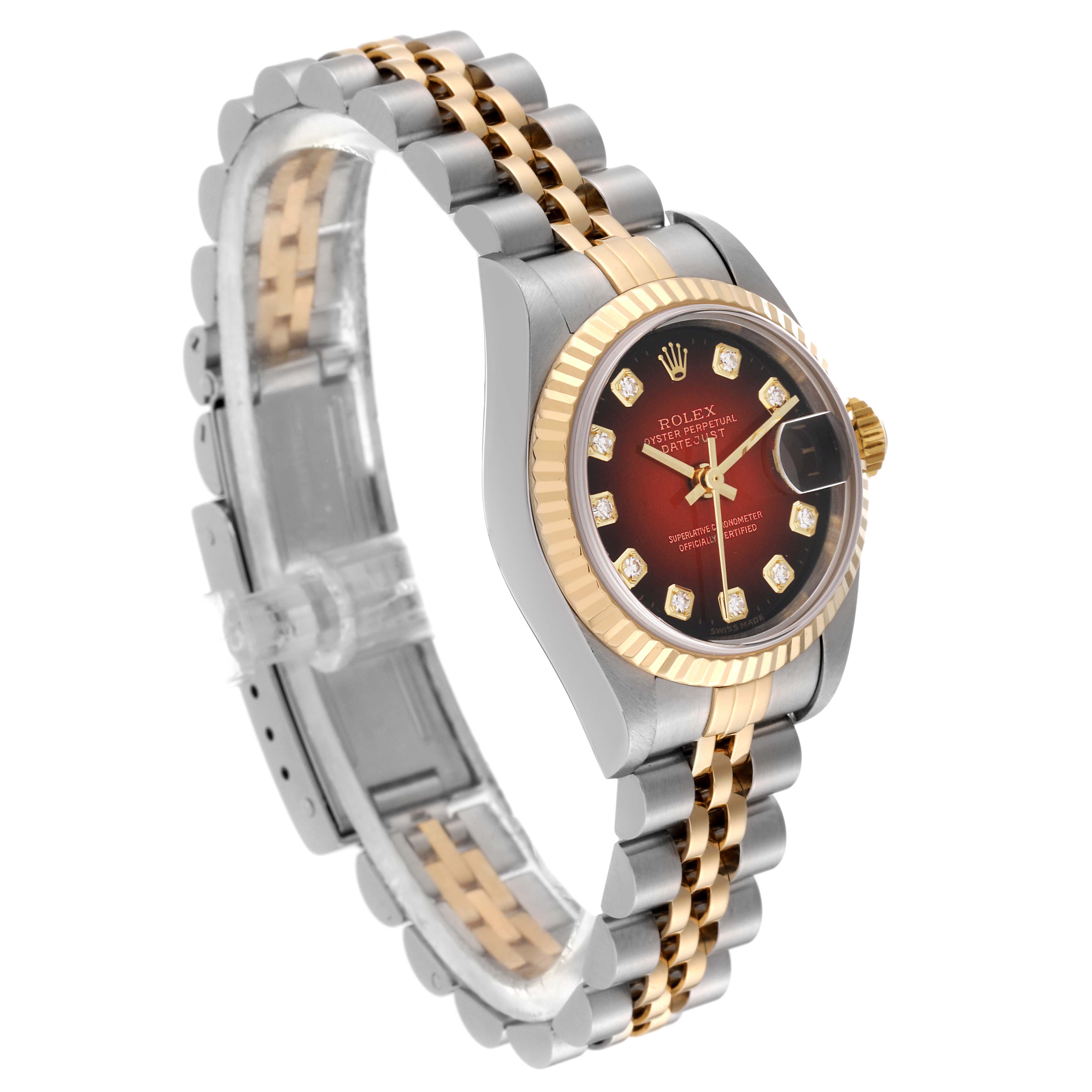 The image shows a Rolex Datejust 79173 Women's Steel and Gold (two tone) Red Dial 79173 Women's Steel and Gold (two tone) Red Dial model at a three-quarter angle featuring its face, bezel, and two-tone bracelet.
