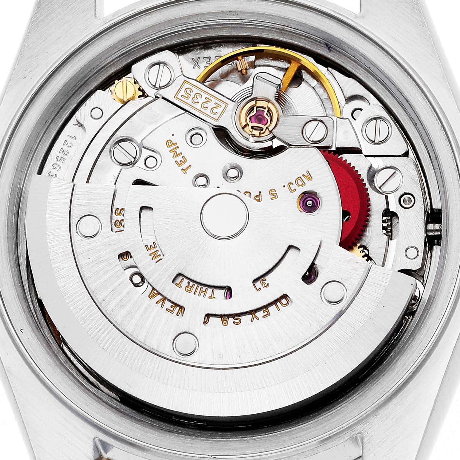 The image shows a top-down view of the inner mechanism of a Rolex Datejust 79173 Women's Steel and Gold (two tone) Red Dial 79173 Women's Steel and Gold (two tone) Red Dial watch, showcasing its intricate movement parts.
