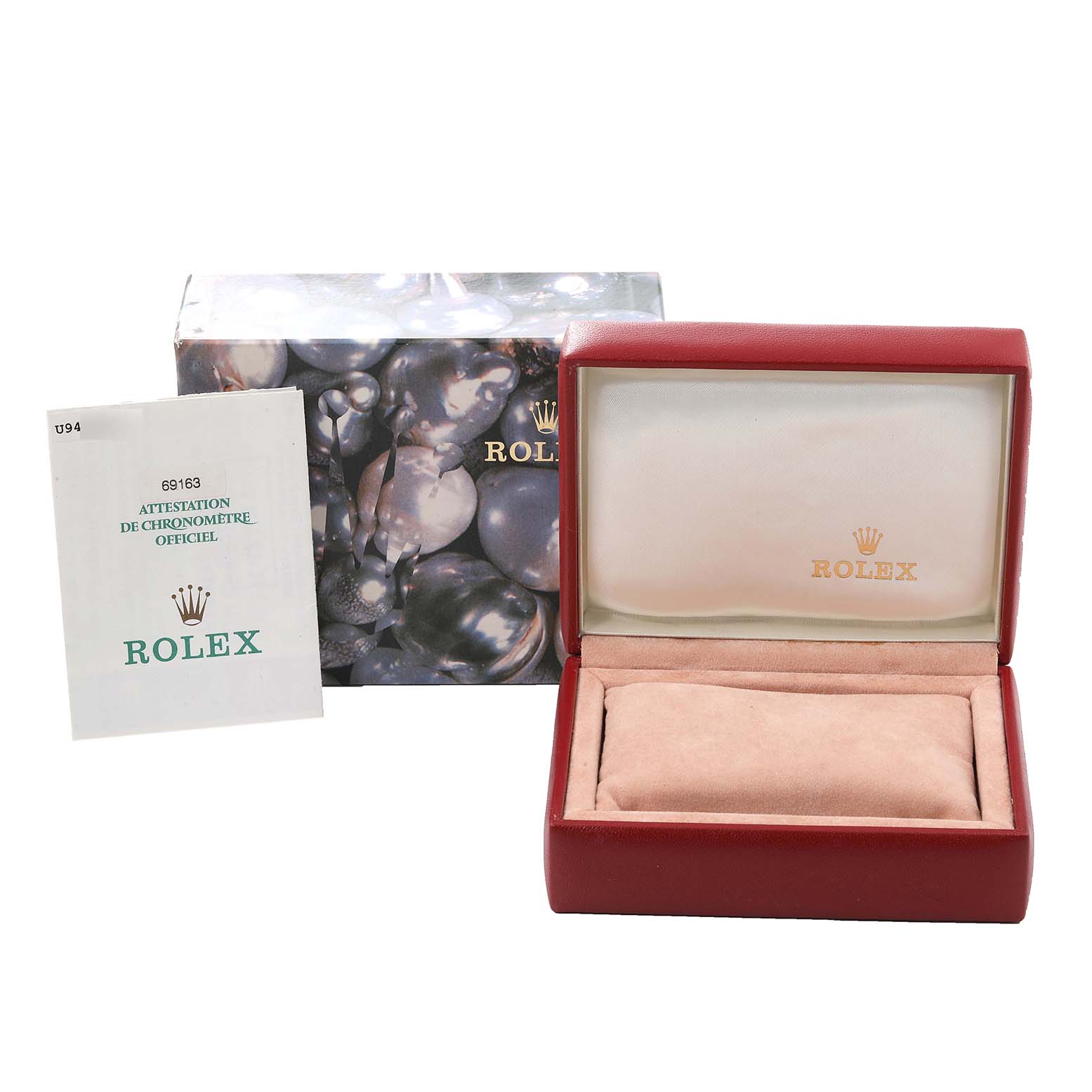 The image shows the packaging and certificate book for the Rolex Datejust 69163 Women's Steel and Gold (two tone) Grey Dial 69163 Women's Steel and Gold (two tone) Grey Dial model.