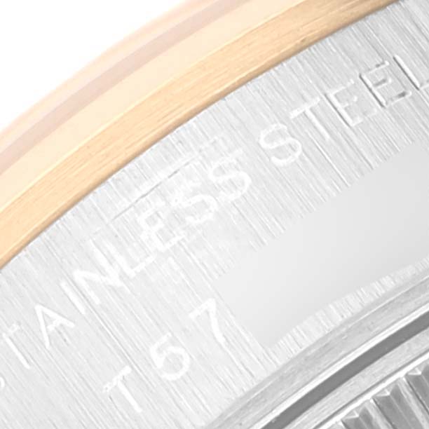 This close-up image of the Rolex Datejust 69163 Women's Steel and Gold (two tone) Grey Dial 69163 Women's Steel and Gold (two tone) Grey Dial watch shows a partial view of the stainless steel case and bezel edge.