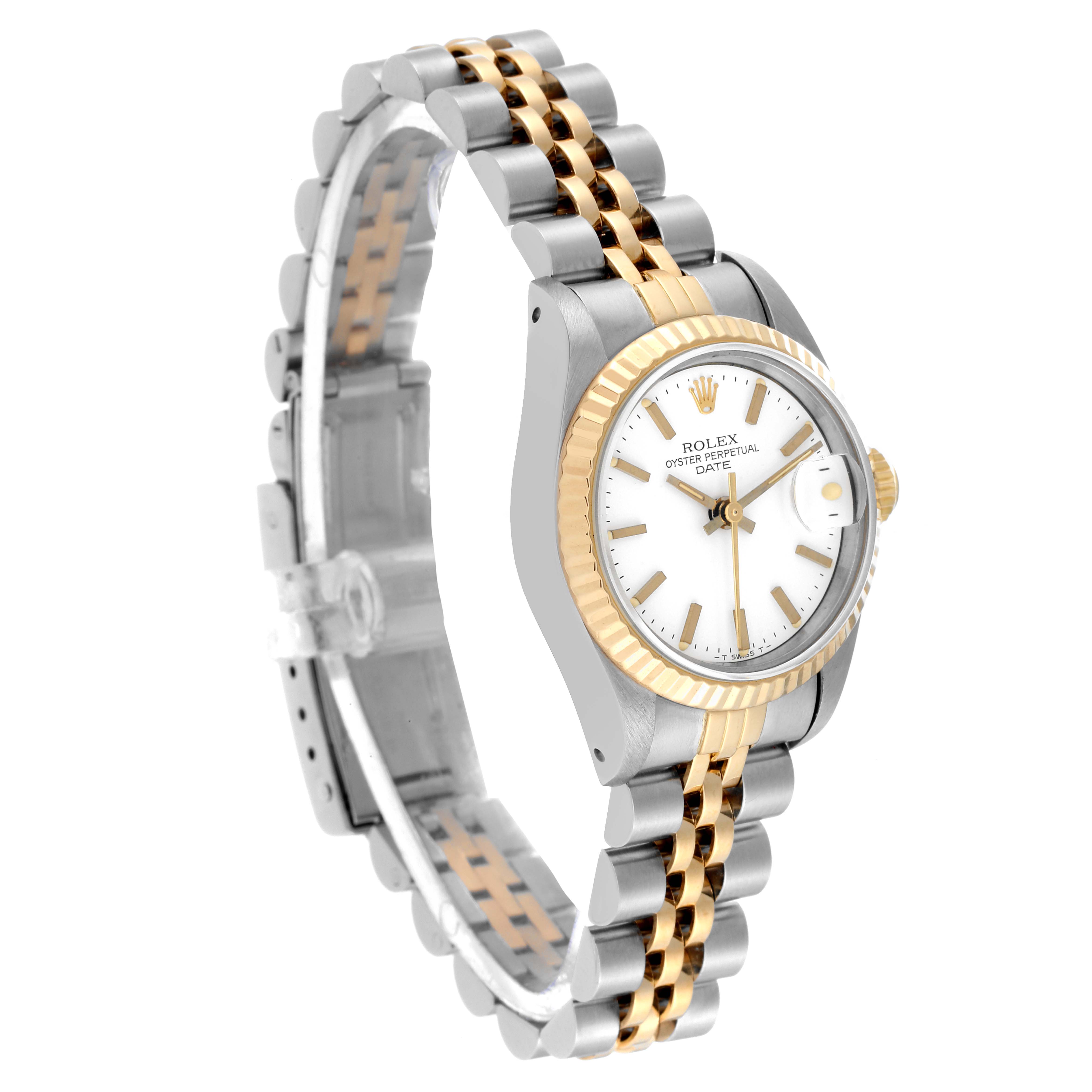The image shows a Rolex Datejust 69173 Women's Steel and Gold (two tone) White Dial 69173 Women's Steel and Gold (two tone) White Dial watch at a three-quarter angle, displaying its two-tone bracelet, dial, and fluted bezel.