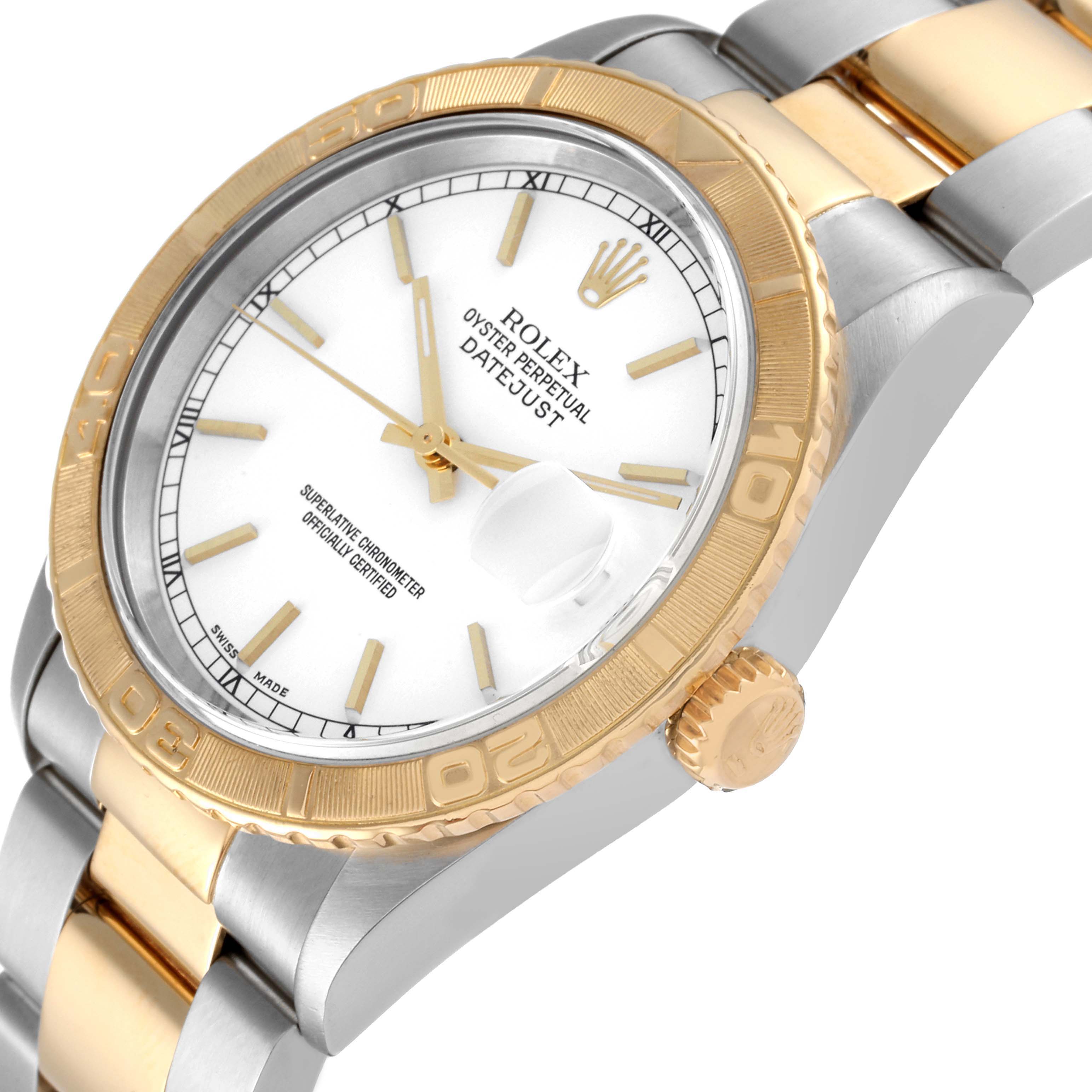 The Rolex Turn-o-Graph 16263 Men
s Steel and Gold (two tone) White Dial 16263 Men
s Steel and Gold (two tone) White Dial watch is shown at an angled close-up, highlighting the dial, bezel, crown, and part of the bracelet.