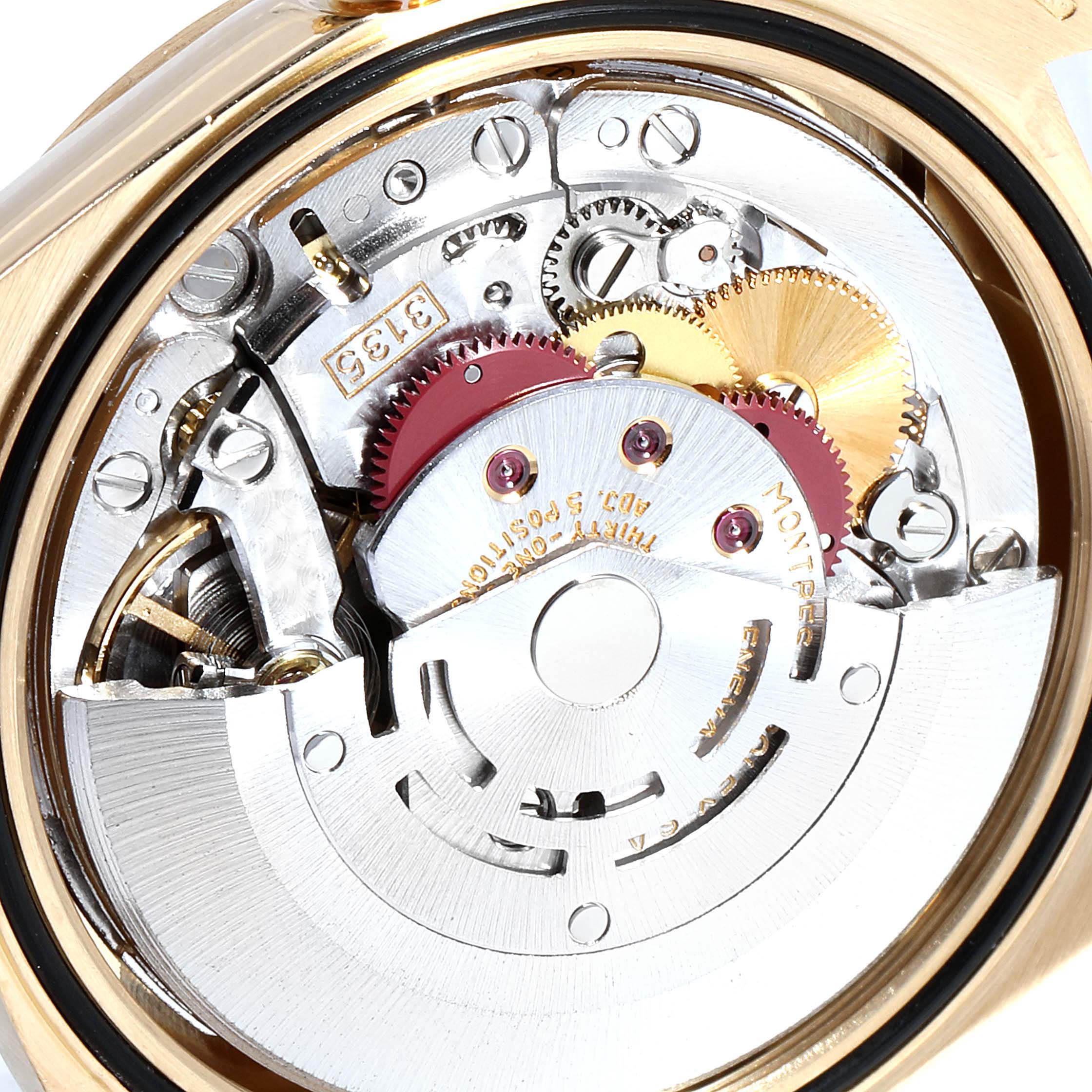 This image shows a close-up view of the intricate inner mechanism of a Rolex President 16238 Men's Yellow Gold Blue Dial 16238 Men's Yellow Gold Blue Dial model watch.